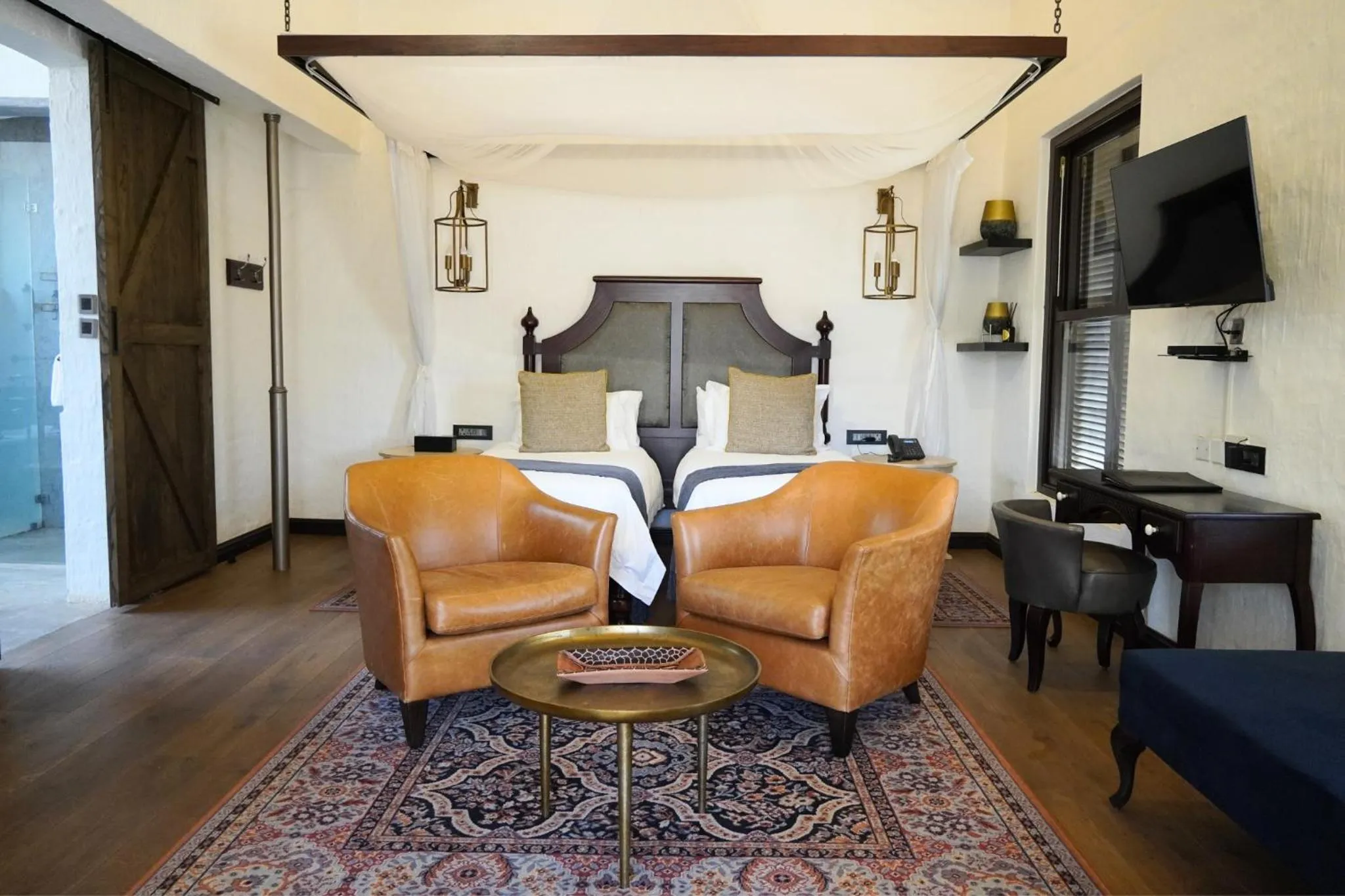 Bed in Mbano Manor Hotel Victoria Falls