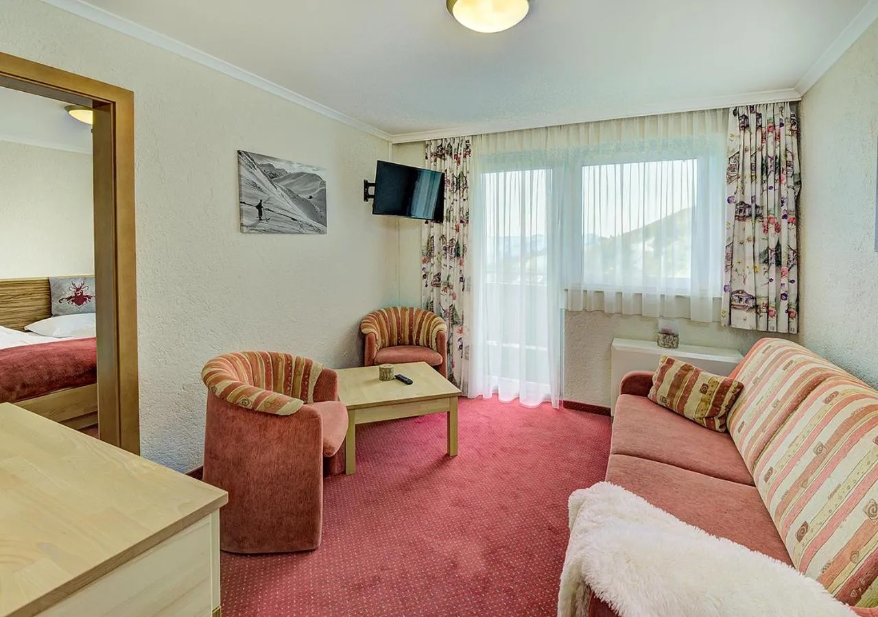 Living room, Bed in Mountainlovers Berghotel SeidlAlm