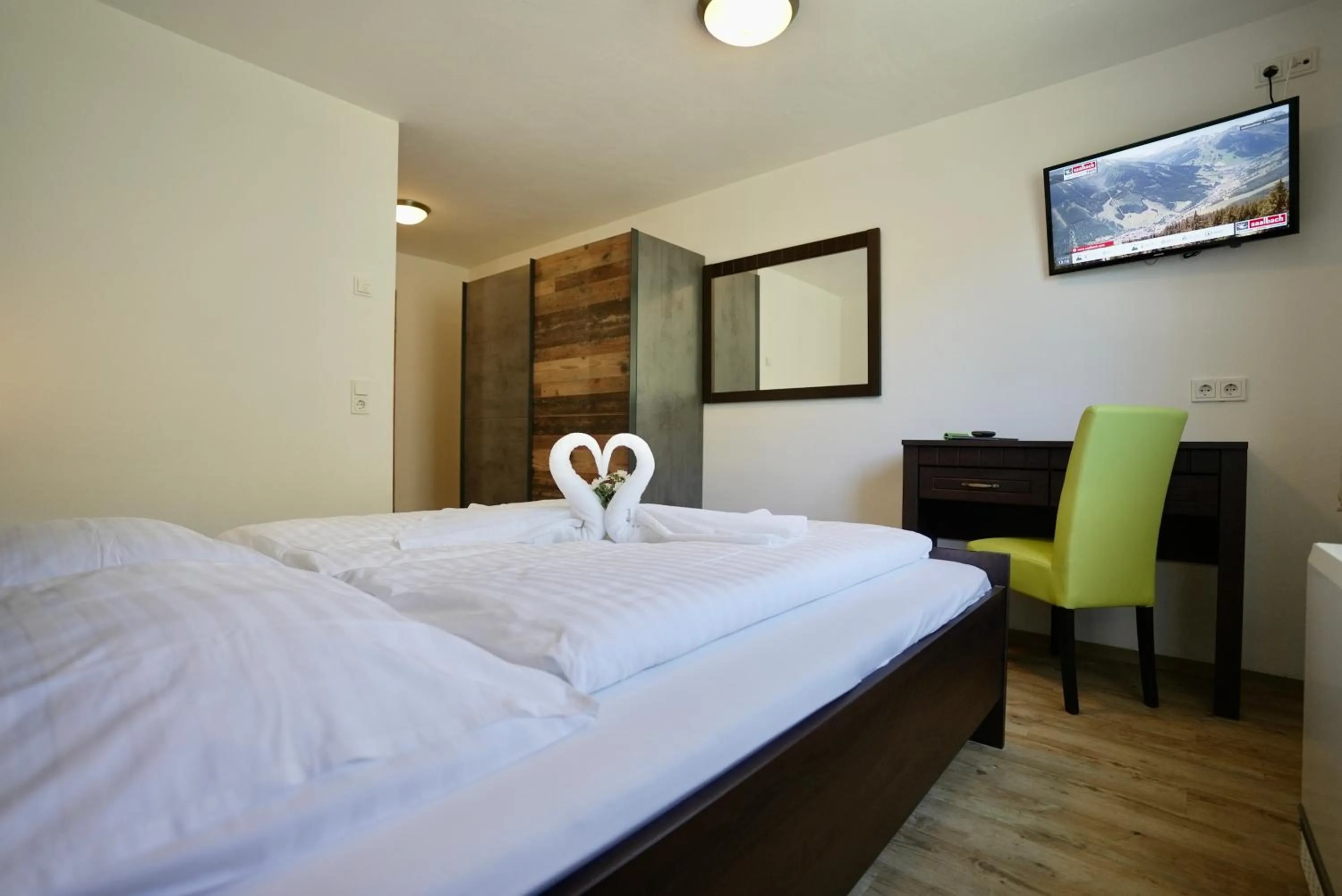 Bed in Mountainlovers Berghotel SeidlAlm