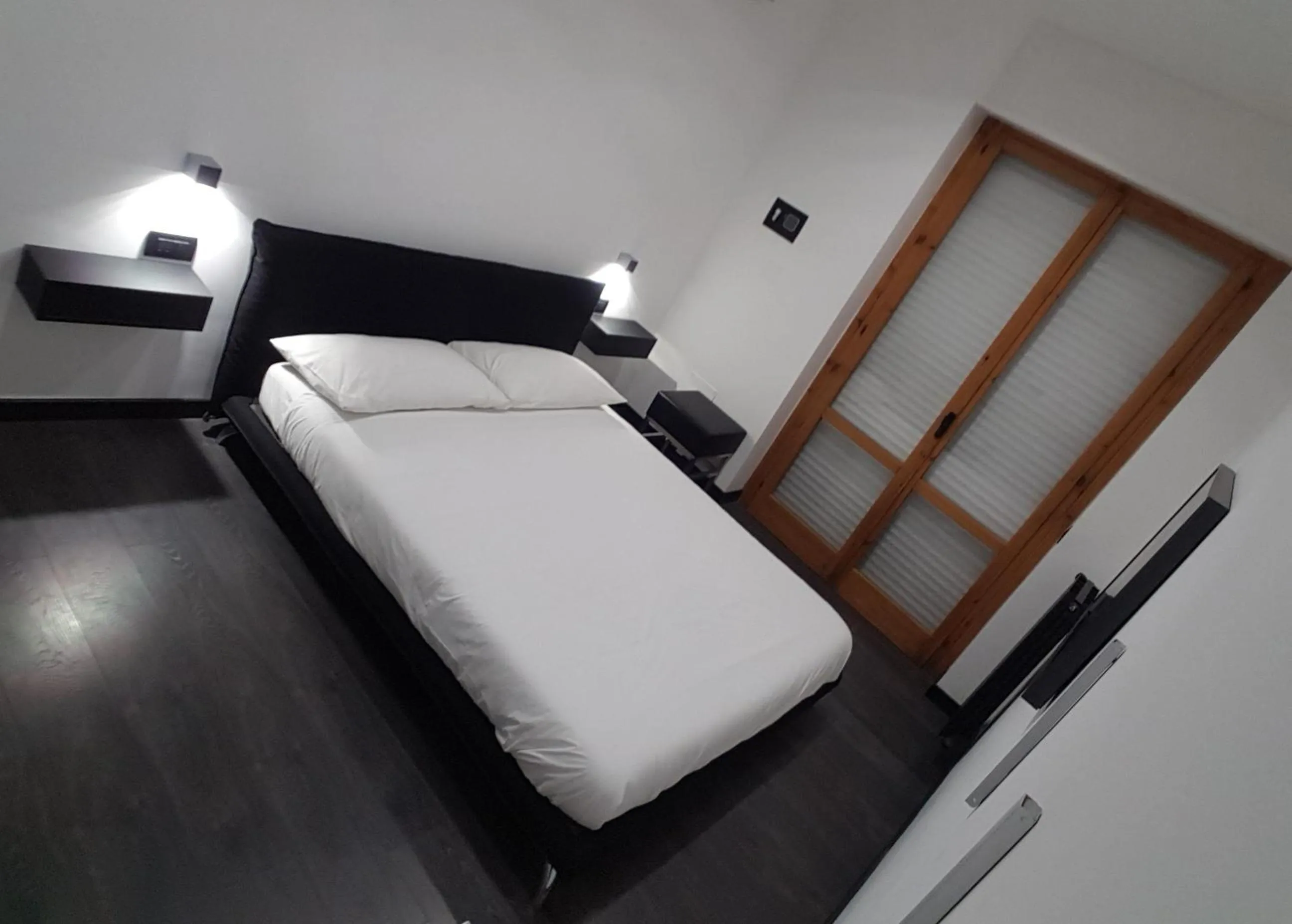 Bed in Cinecittà Luxury GUEST HOUSE