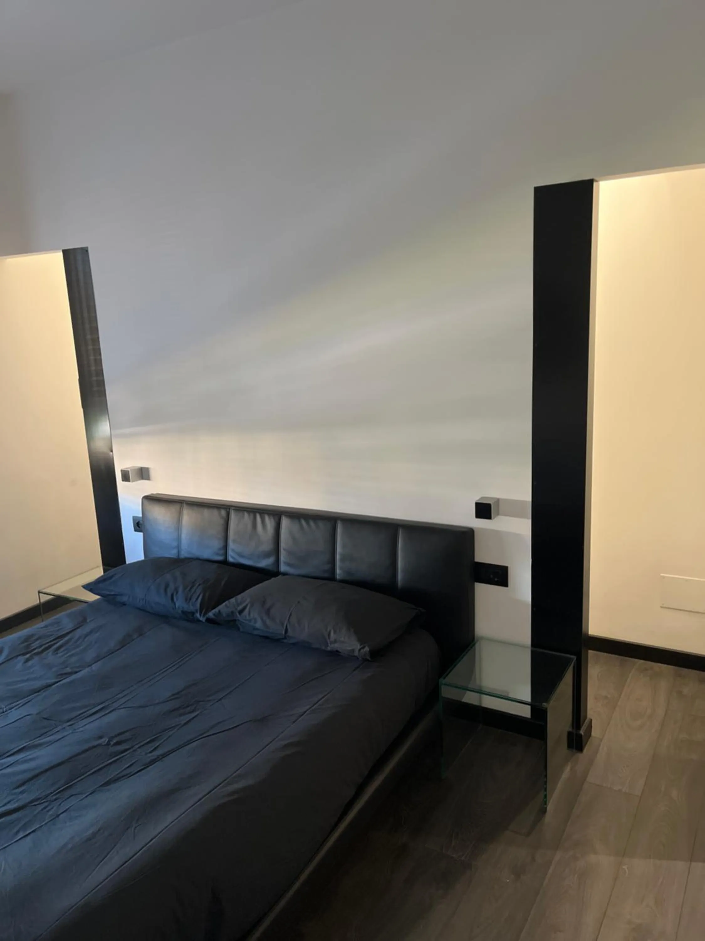 Bed in Cinecittà Luxury GUEST HOUSE