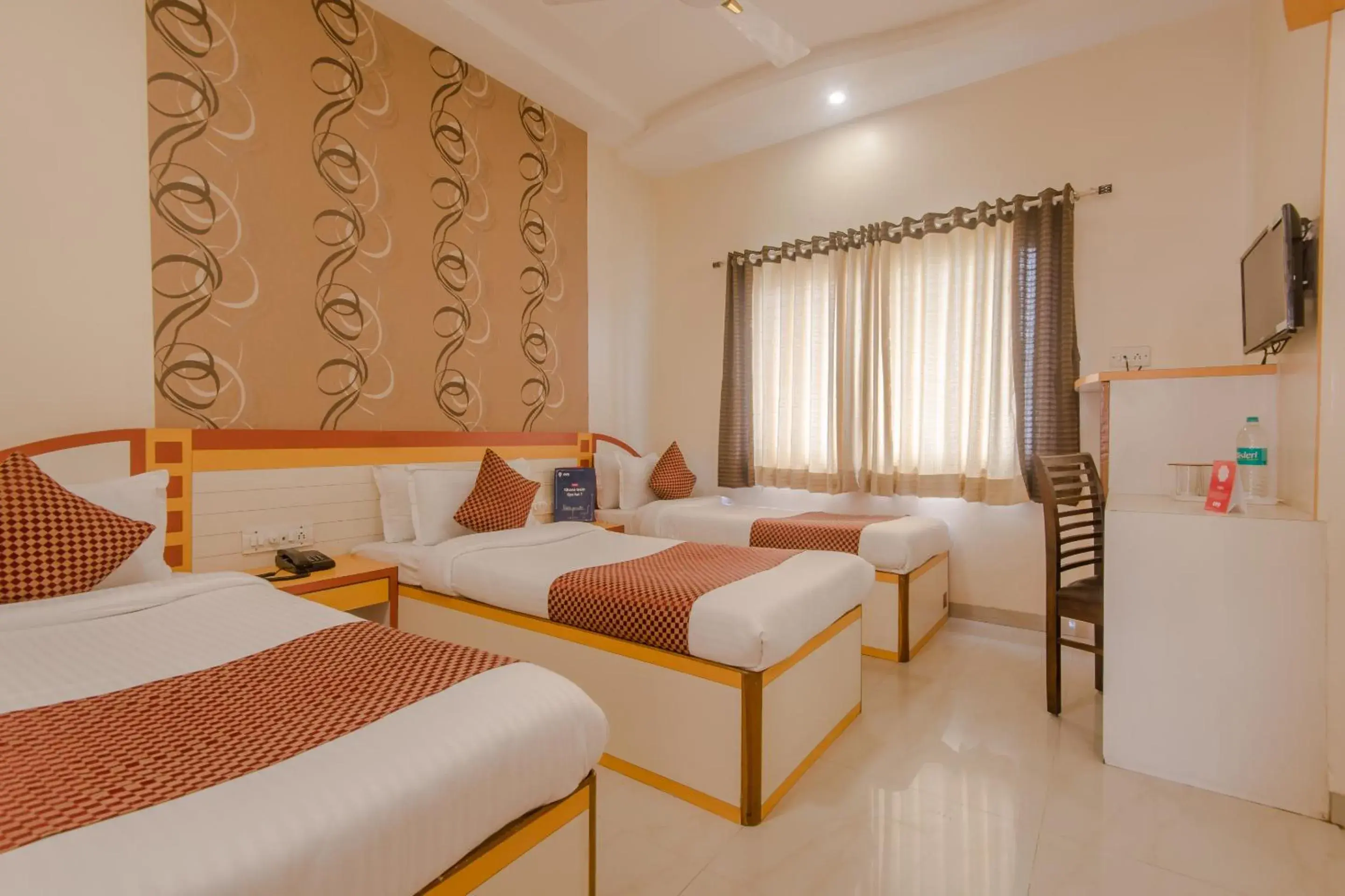 Economy Triple Room in Hotel Sai Country Inn by Shantikamal Economy Triple Room in Hotel Sai Country Inn by Shantikamal