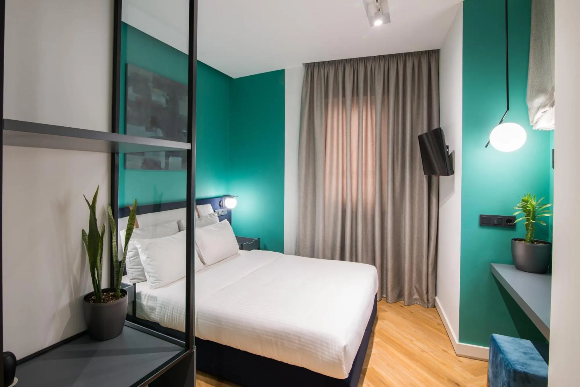 Bed in Ederlezi Zoubourlou Aparthotel