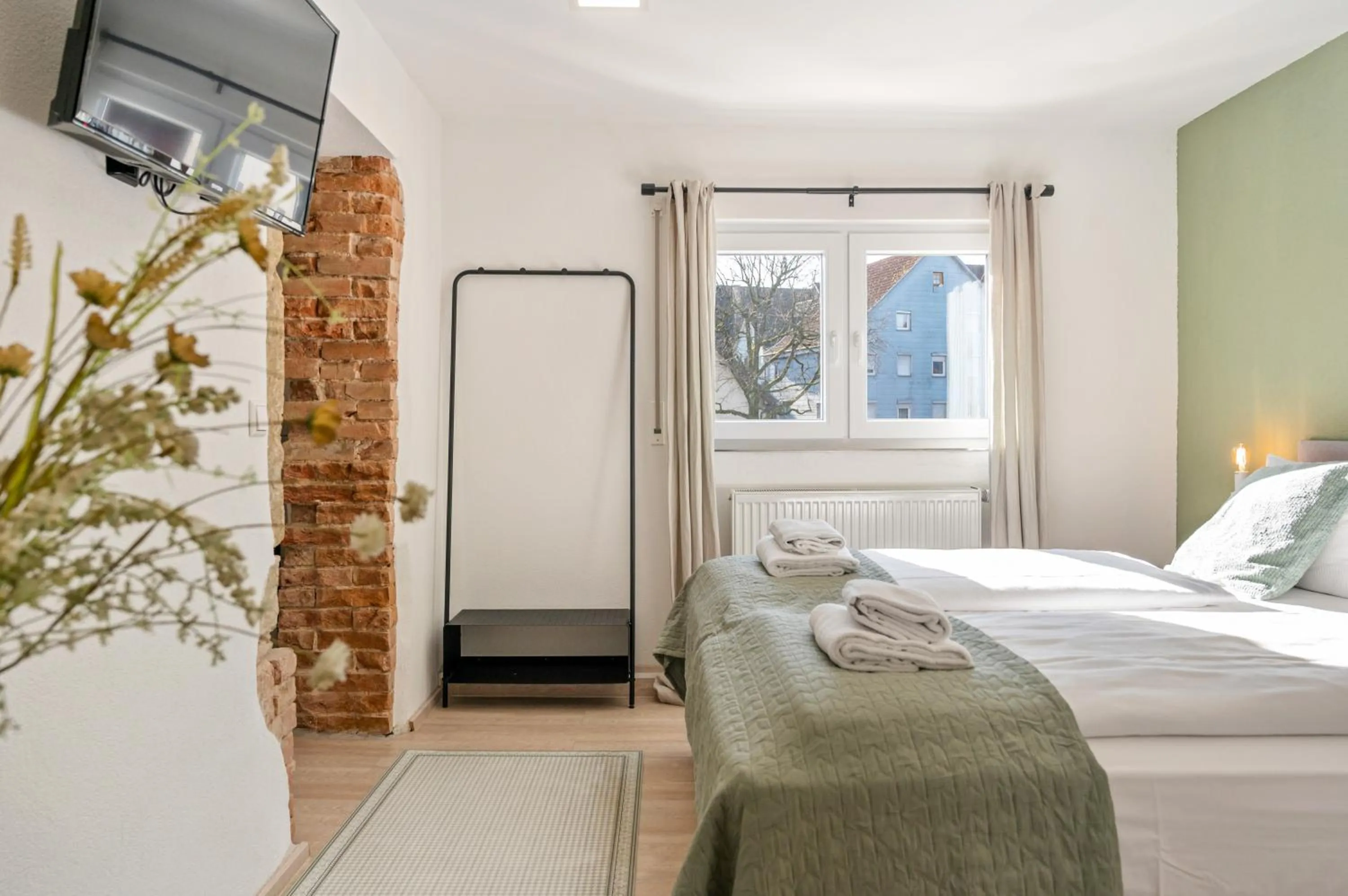 Photo of the whole room, Bed in Sali Homes - GaesteHaus Lamm Obersulm