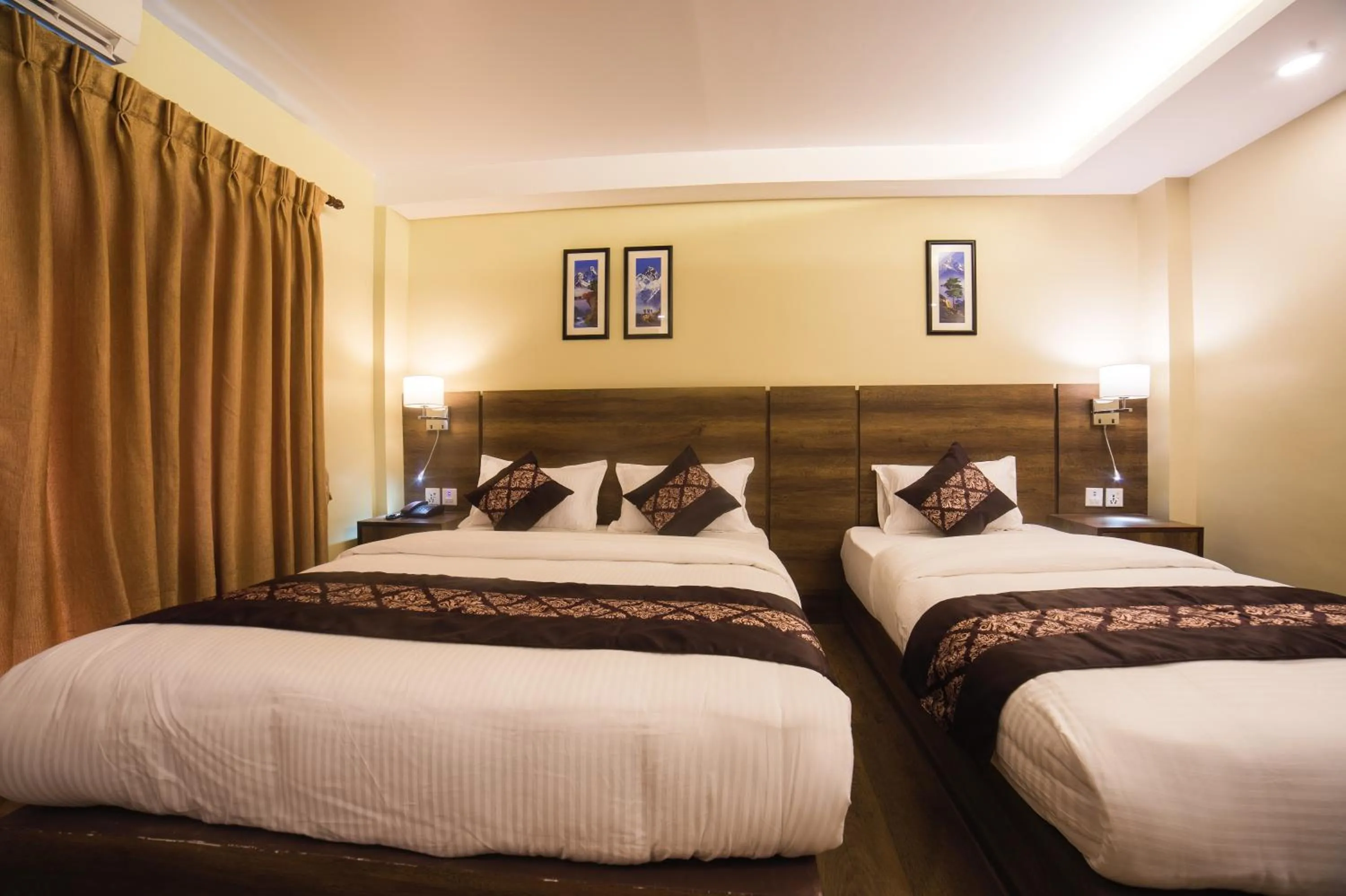 Bed in Ganapati Airport Hotel