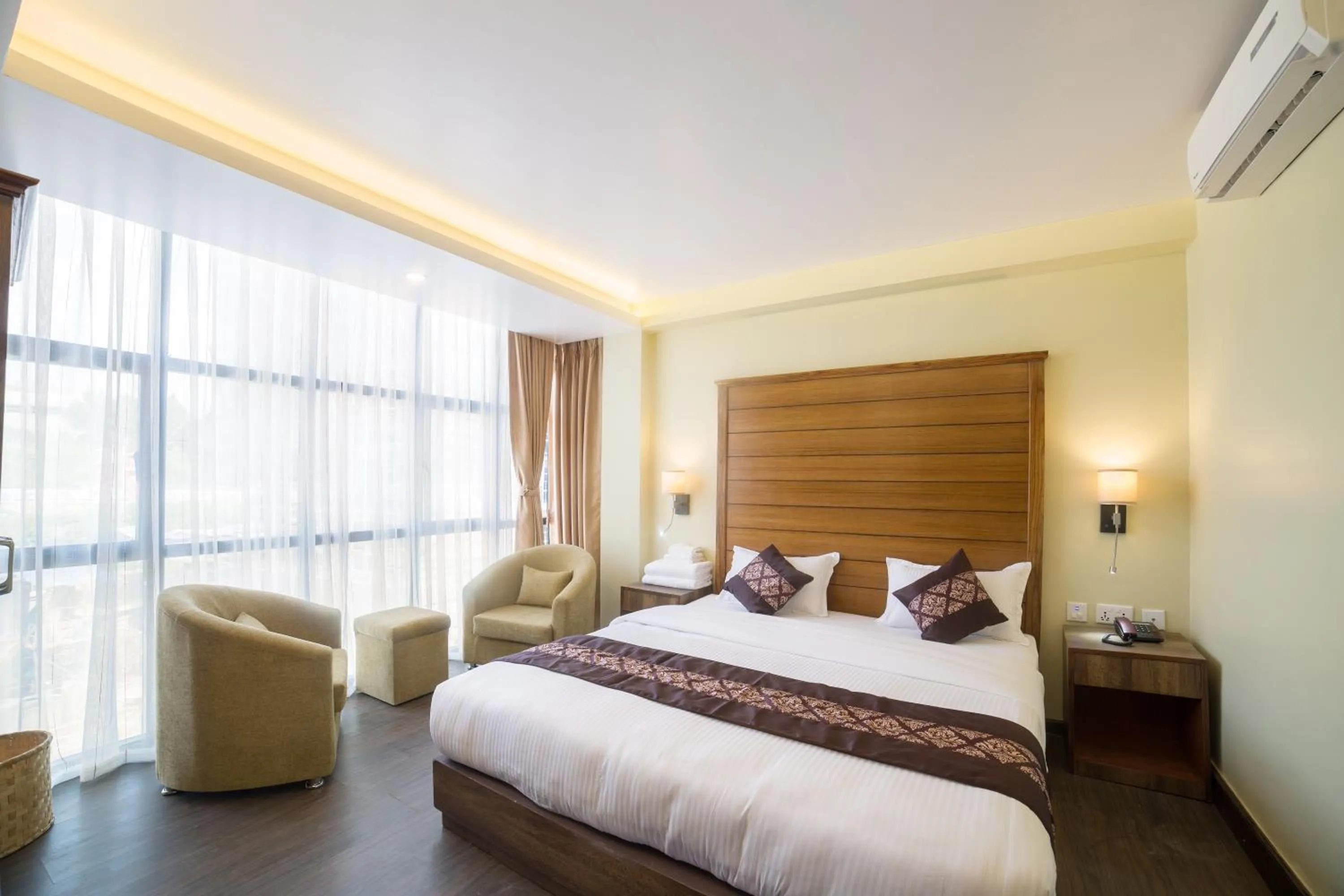 Bed in Ganapati Airport Hotel