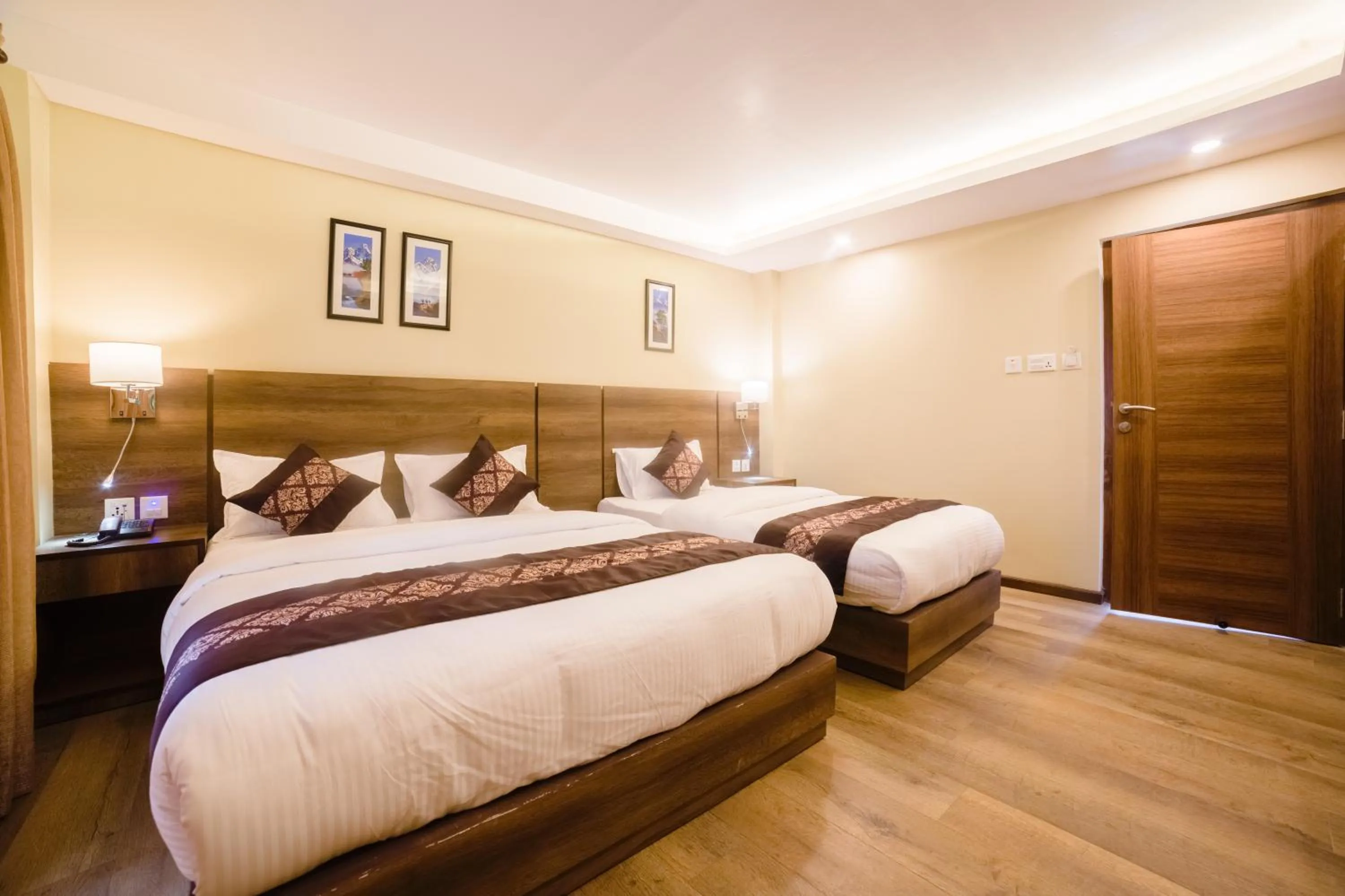 Bed in Ganapati Airport Hotel