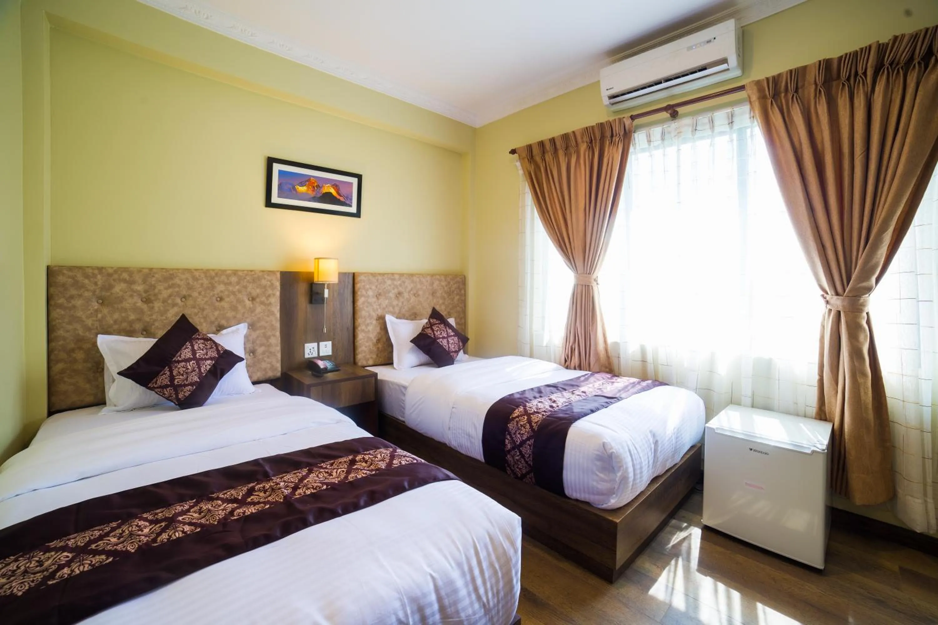 Bed in Ganapati Airport Hotel