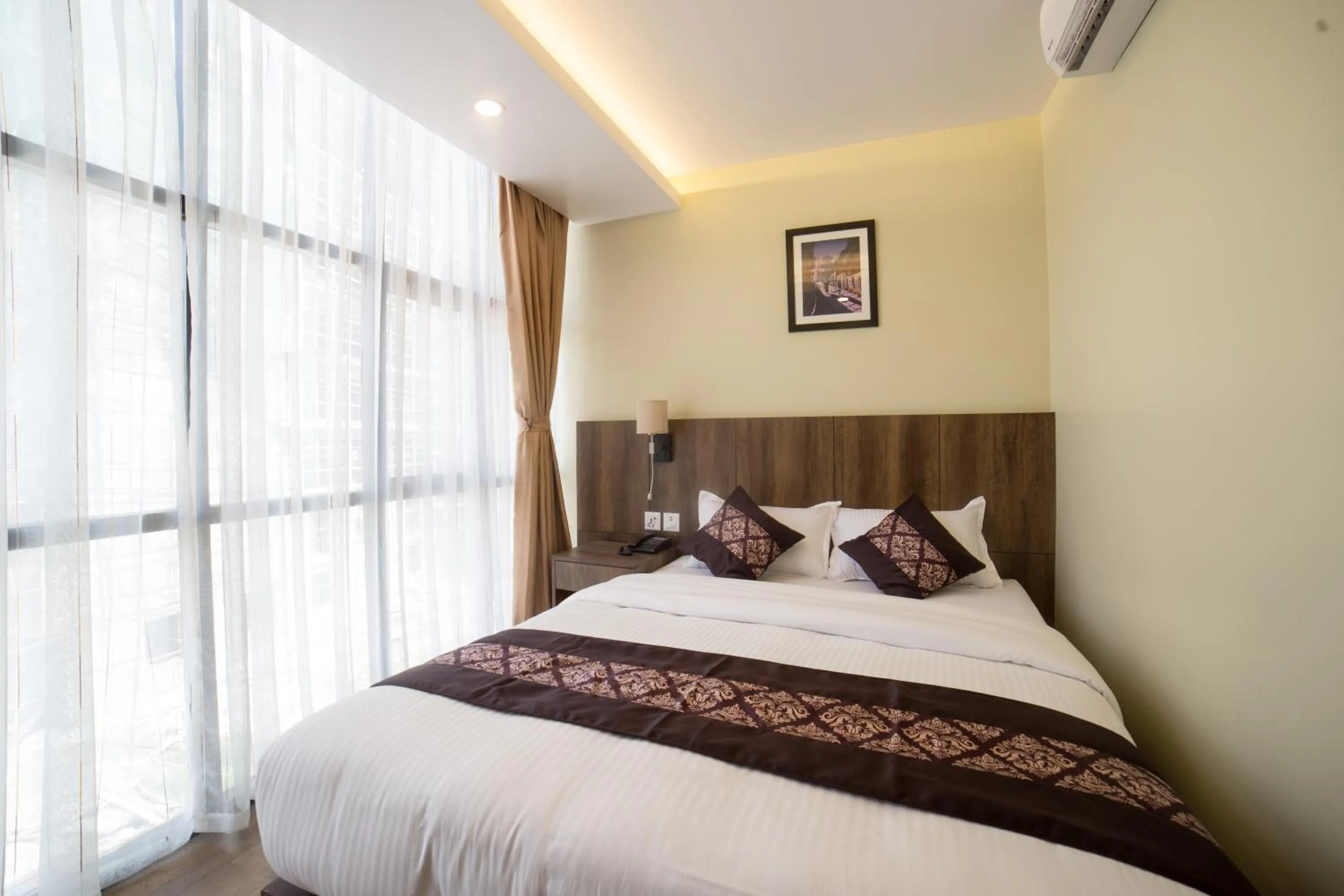 Bed in Ganapati Airport Hotel