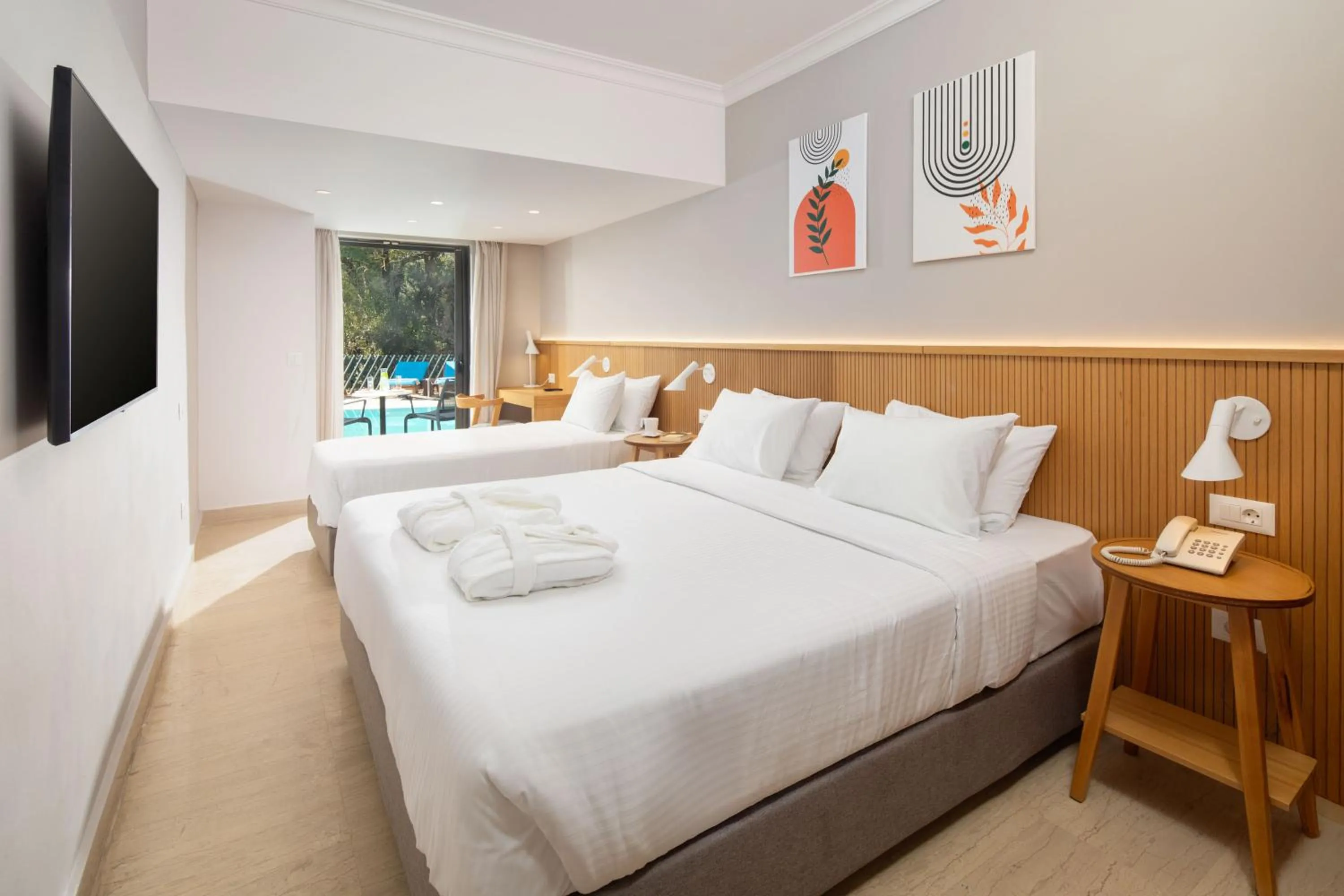 Bed in Roda Beach Resort & Spa