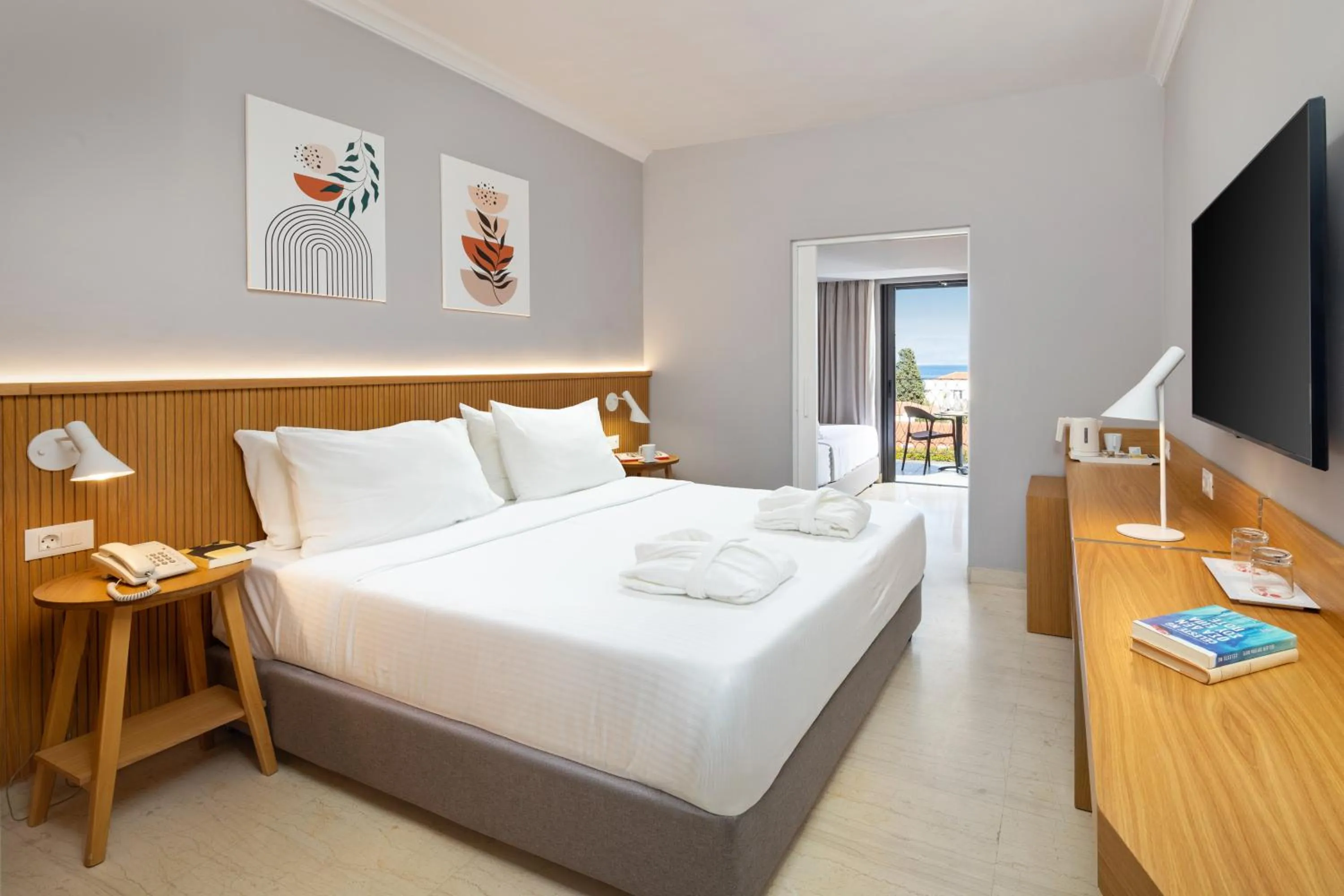 Bed in Roda Beach Resort & Spa