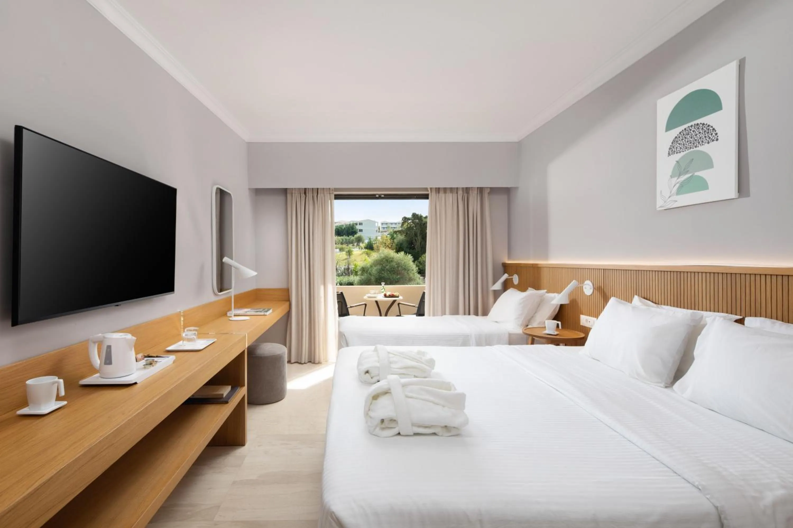 Bed in Roda Beach Resort & Spa