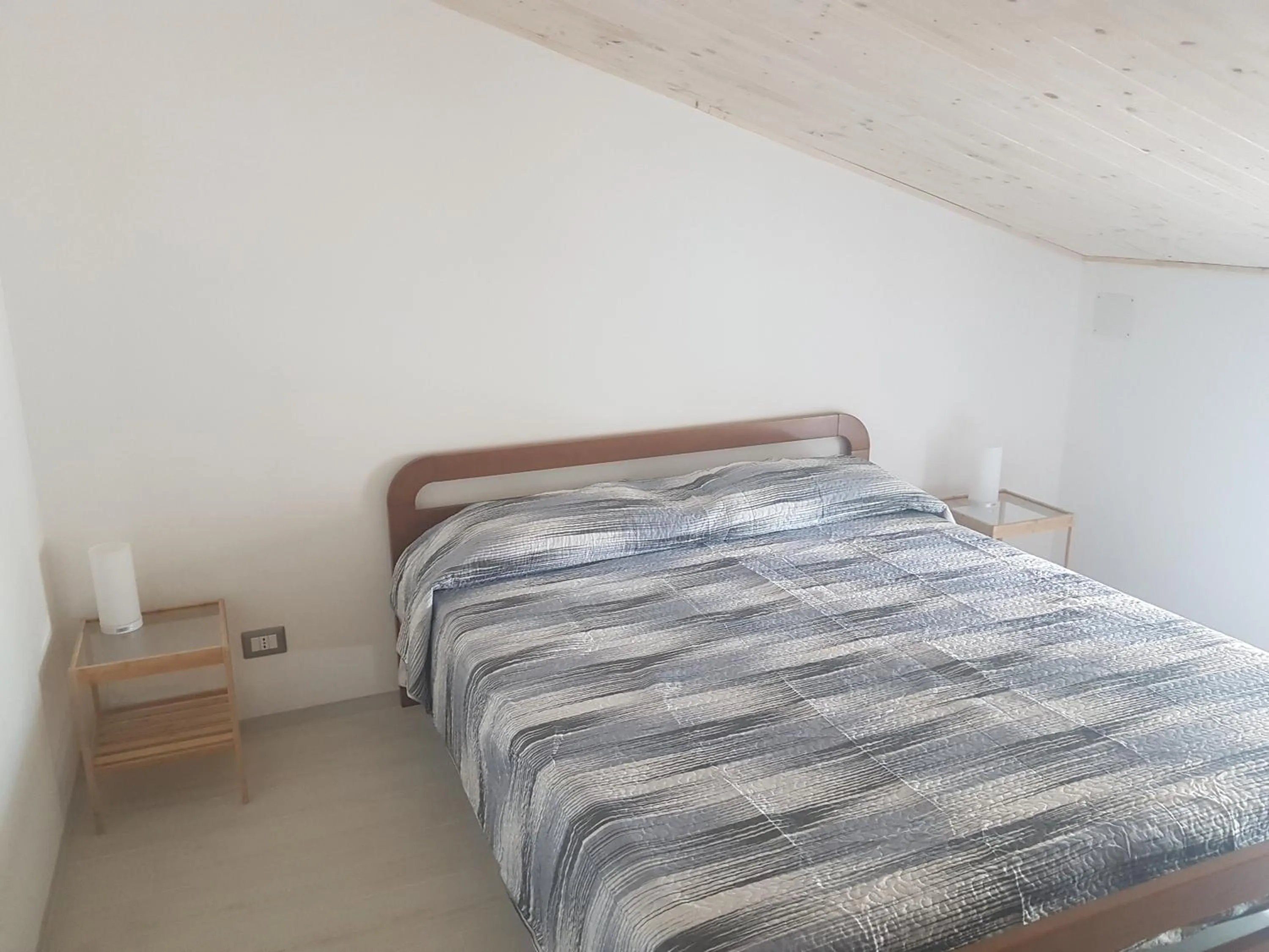 Photo of the whole room, Bed in La Casetta di Vitty