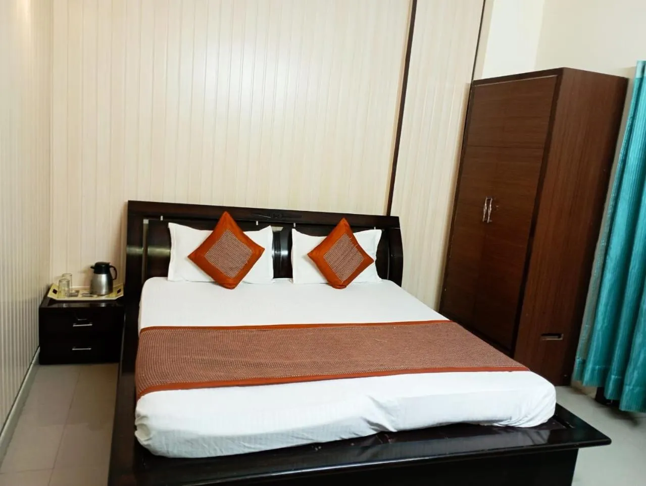 Toilet, Bed in Hotel Home Stay Dwarka
