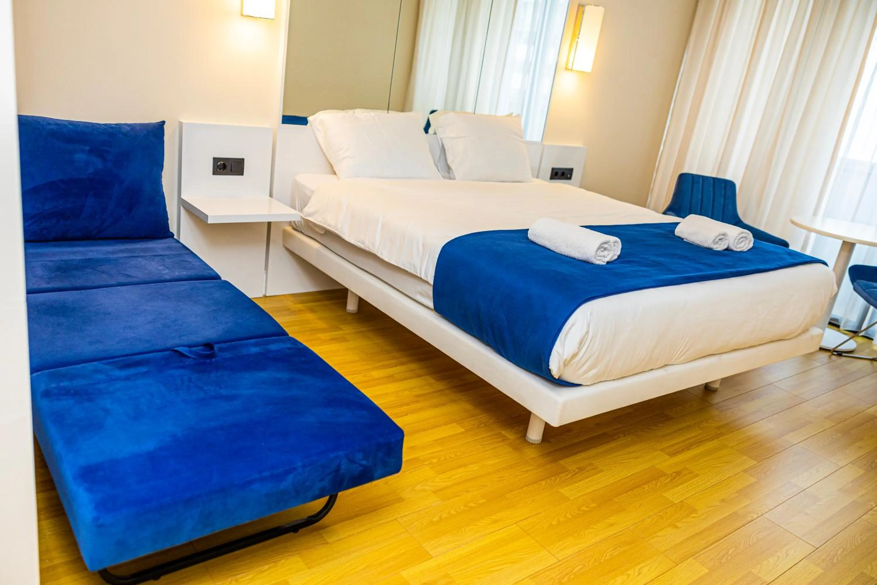 Bed in Orbi City Inn