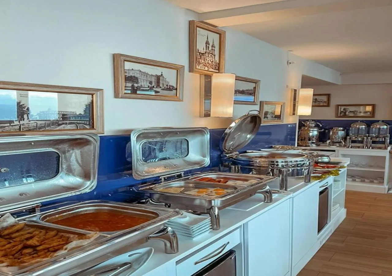 Kitchen or kitchenette in Orbi City Inn