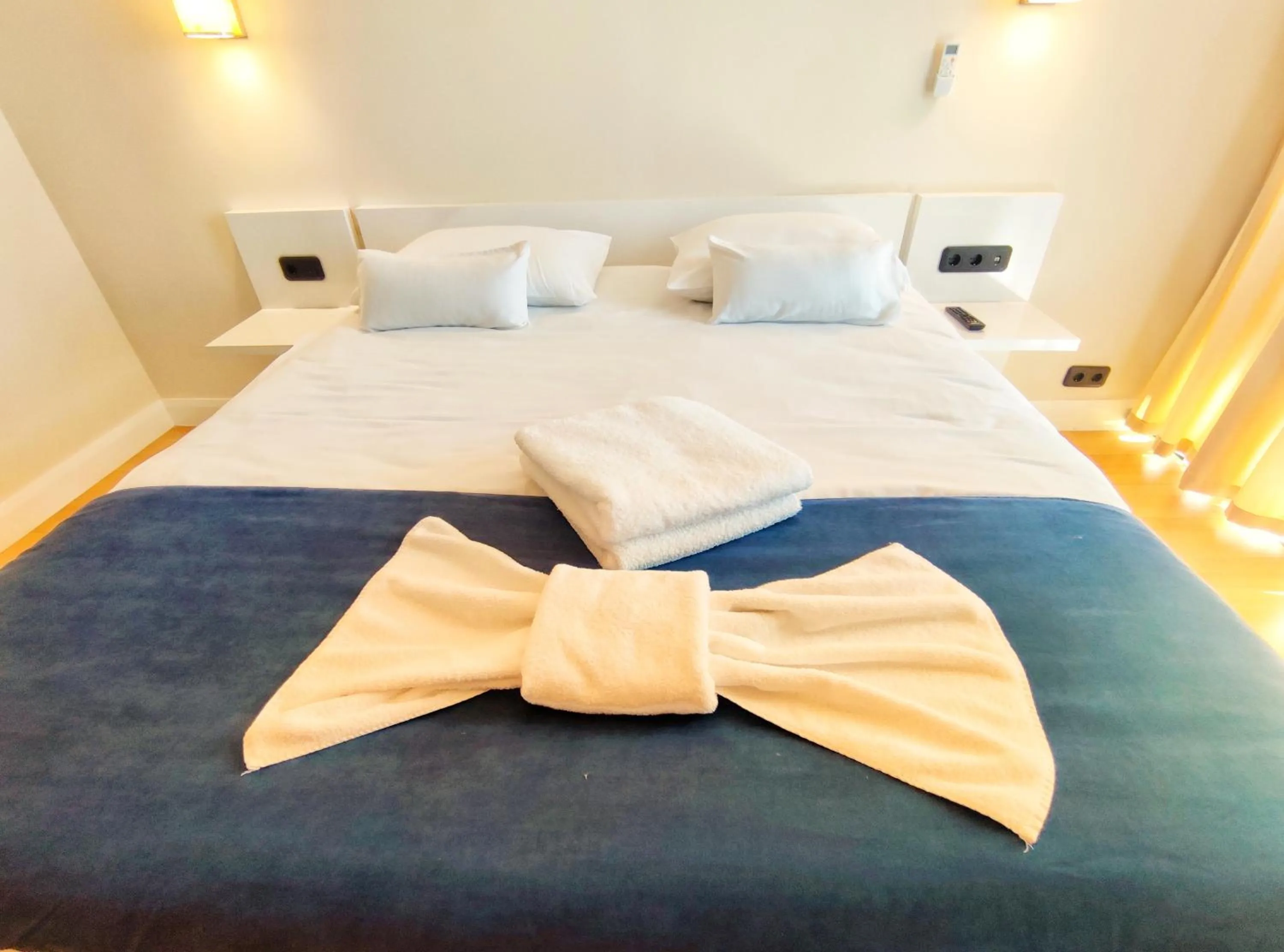 Bed in Orbi City Inn