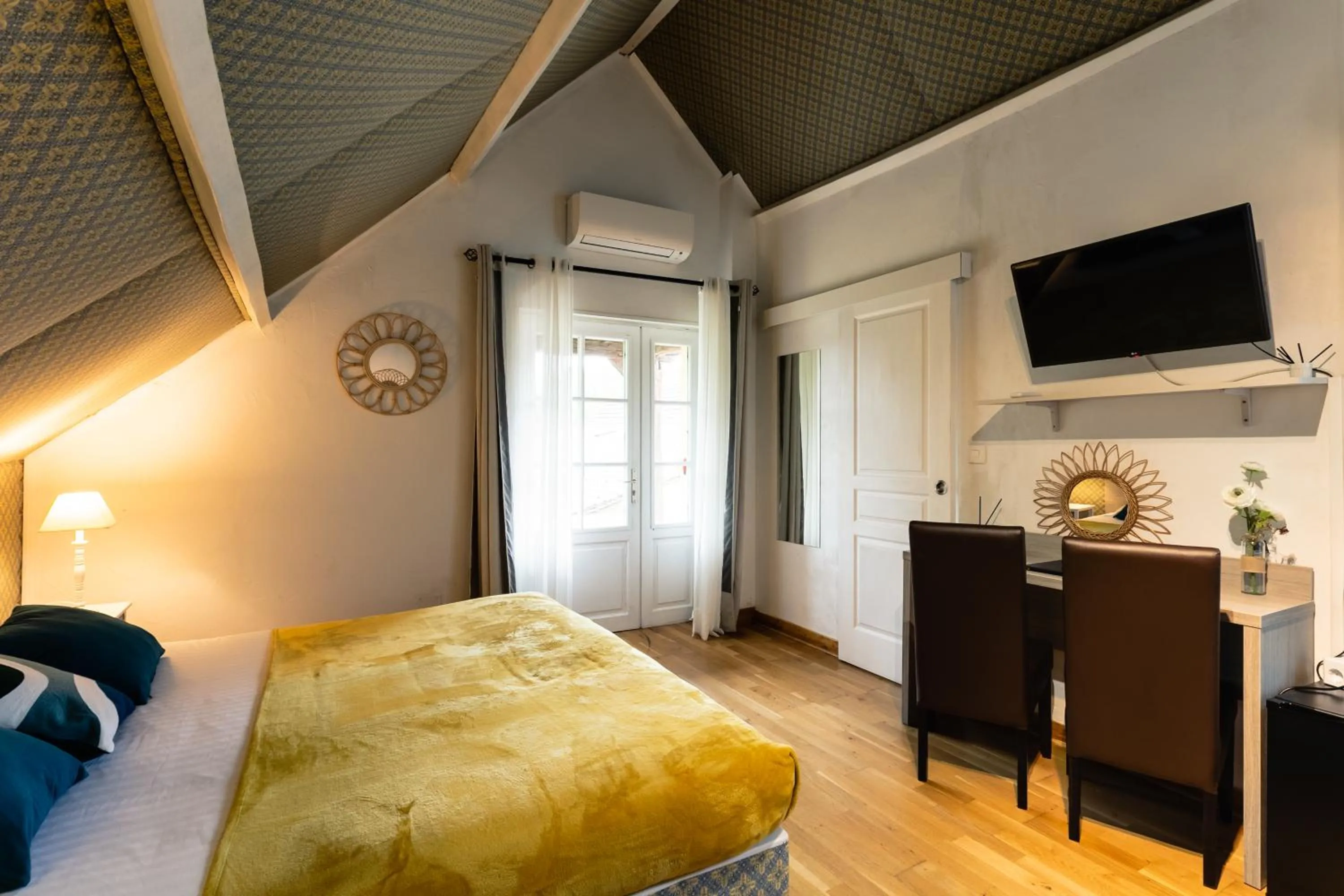 Photo of the whole room, Bed in Hôtel de la Ferme Lamy