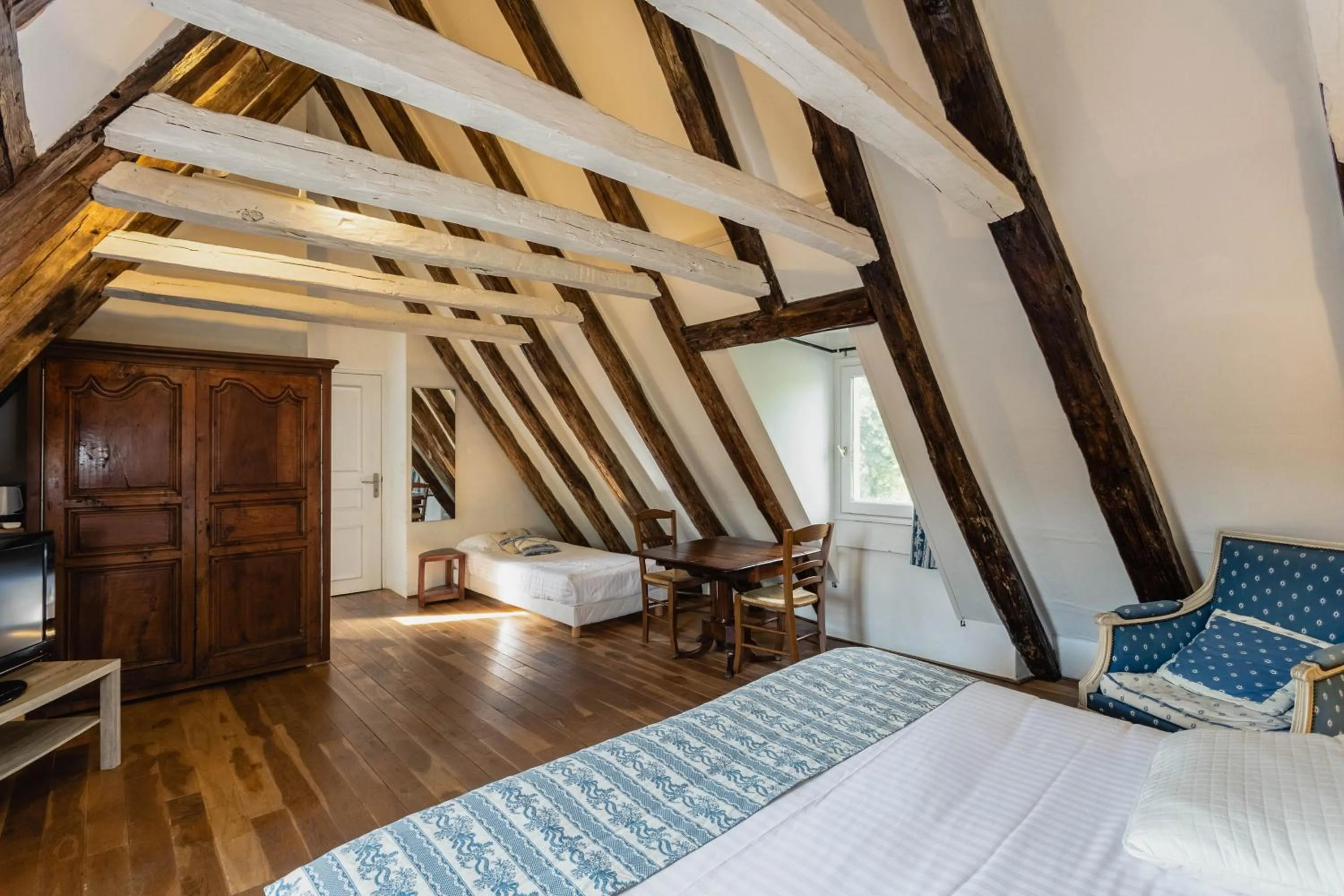 Photo of the whole room, Bed in Hôtel de la Ferme Lamy