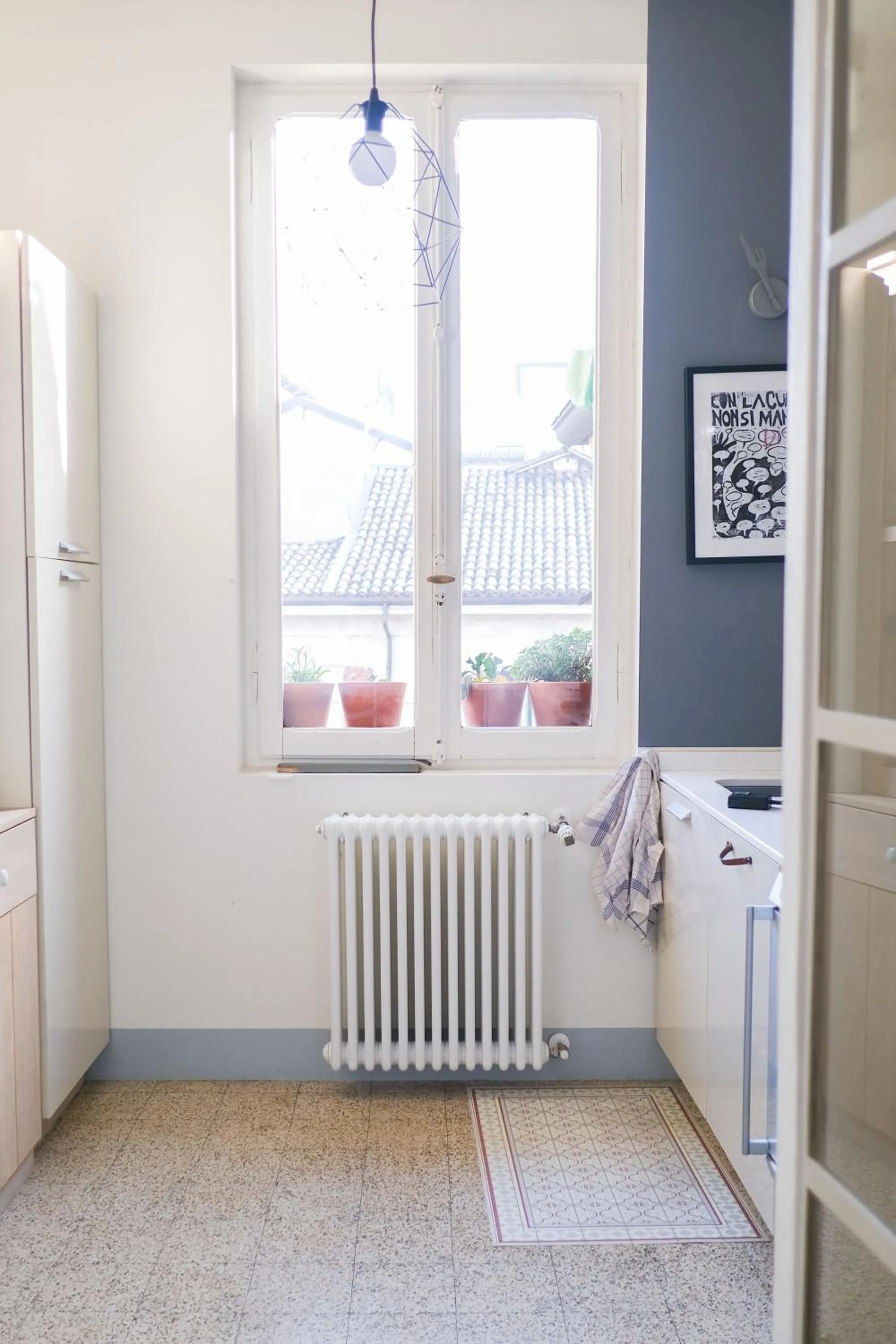 Communal kitchen in Vicolo Folletto Home