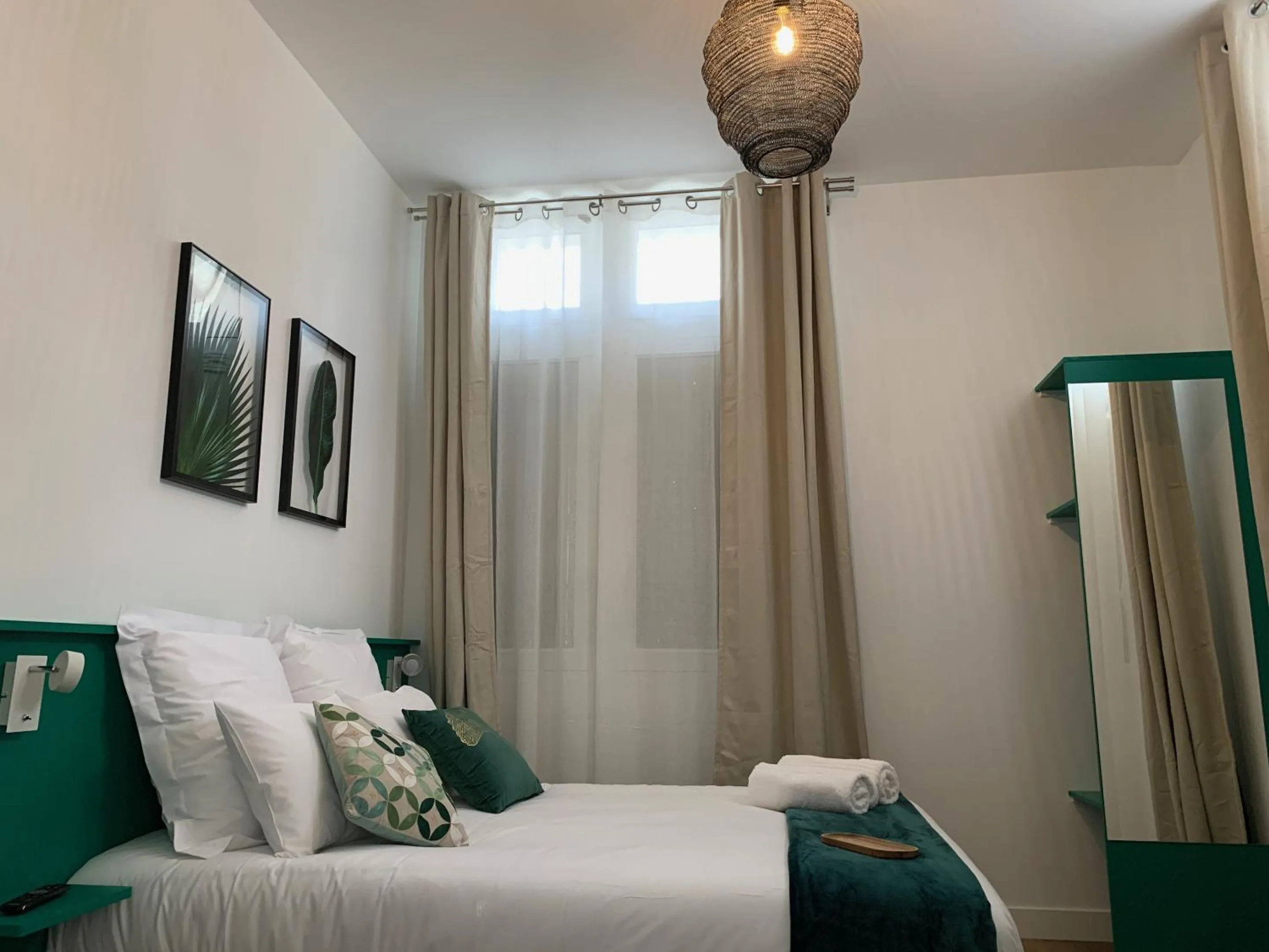 Bedroom in Logis St Joseph