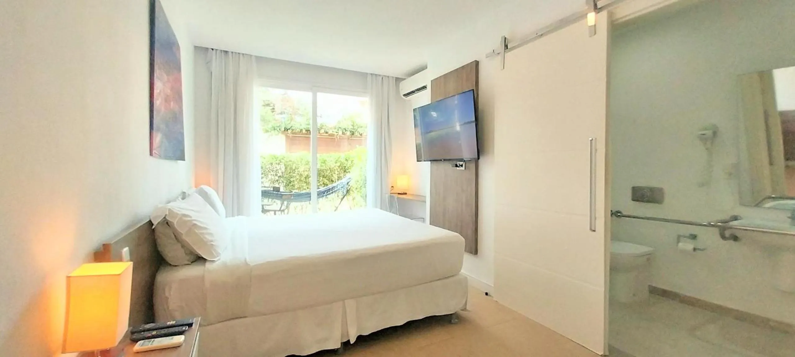 TV and multimedia, Bed in Parador Búzios Boutique Hotel