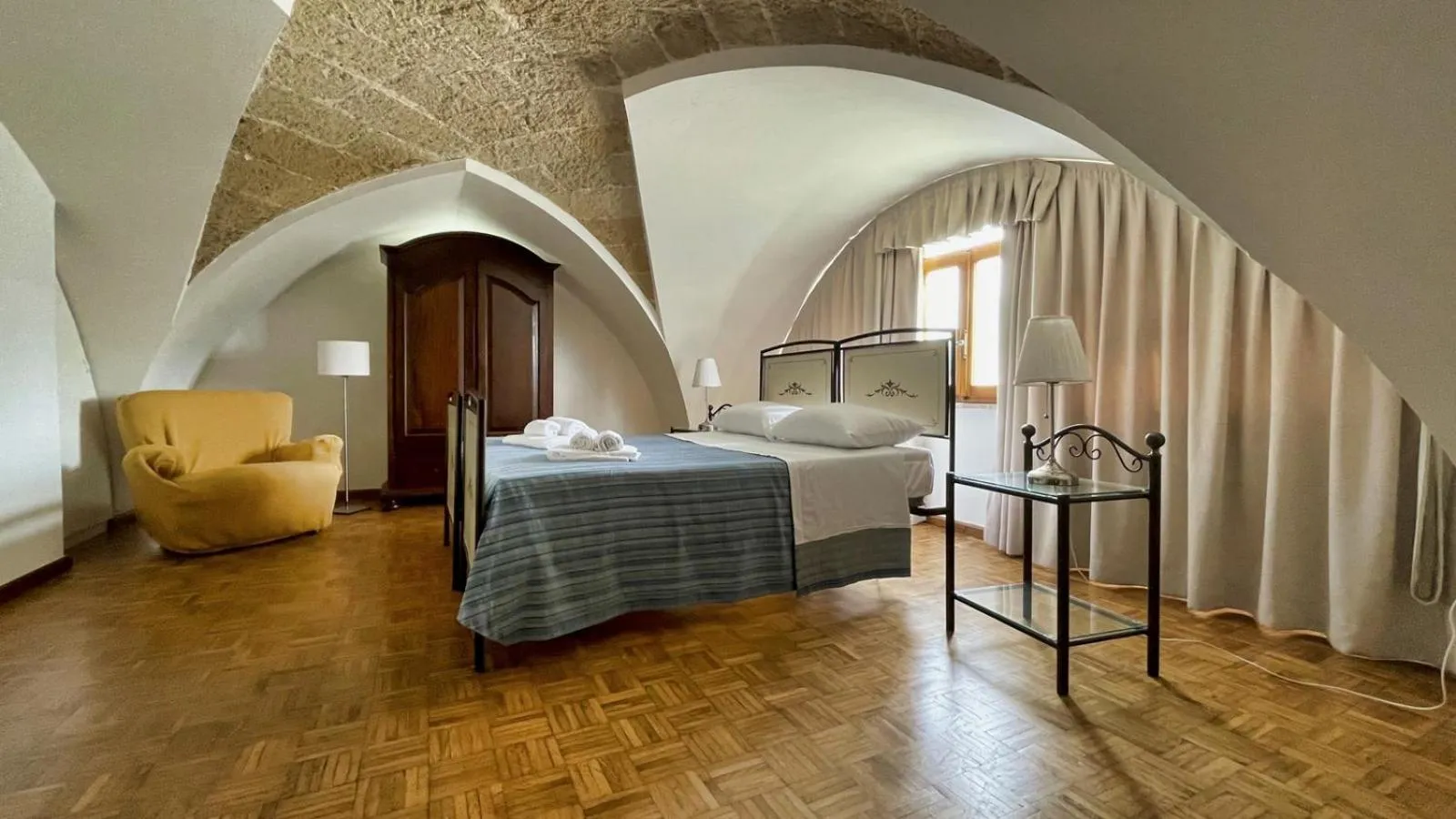 Bed in La Corte di Leuca Residence