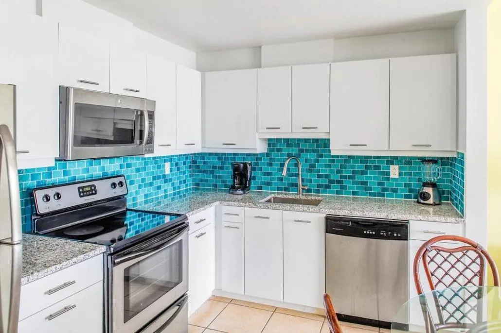 Kitchen or kitchenette in Coral Gardens on Grace Bay