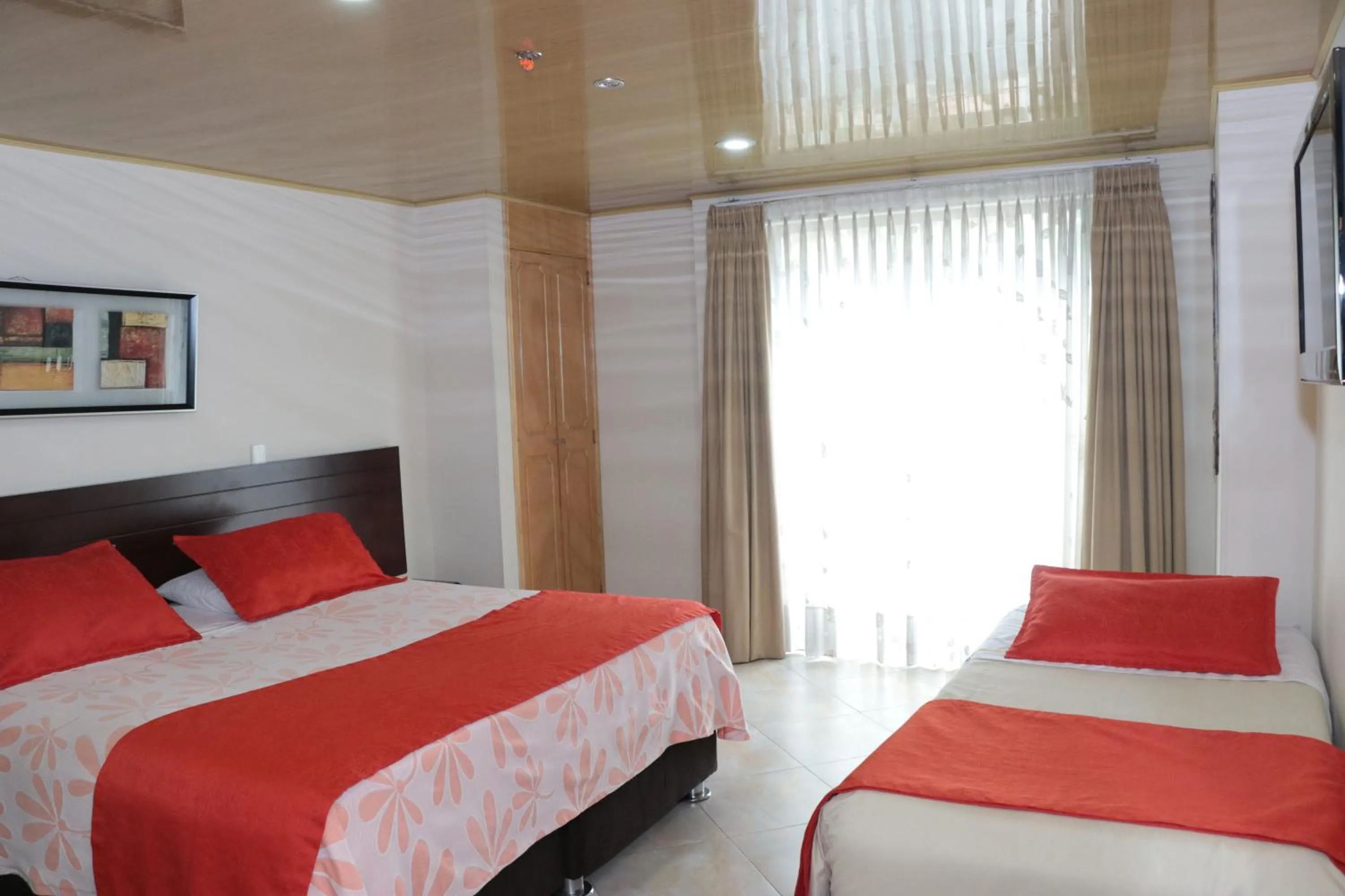 Triple Room in Hoteles Bogotá Inn El Lago Country Zona Rosa