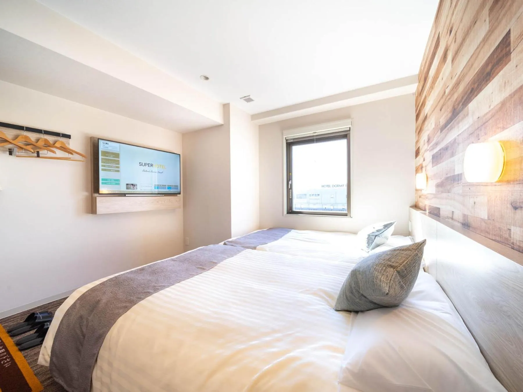 Bed in Super Hotel Premier Shimonoseki