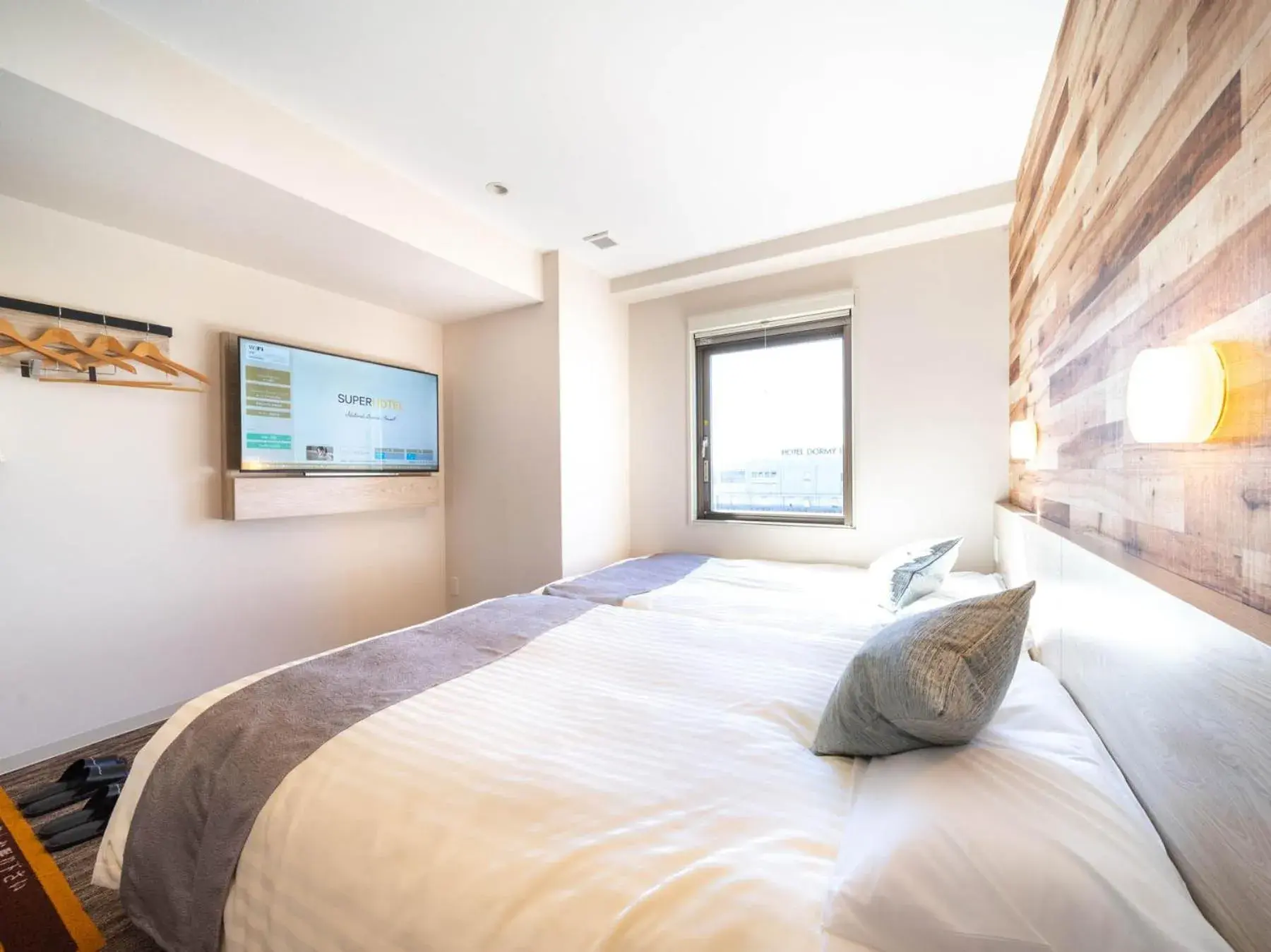 Bed in Super Hotel Premier Shimonoseki Bed in Super Hotel Premier Shimonoseki