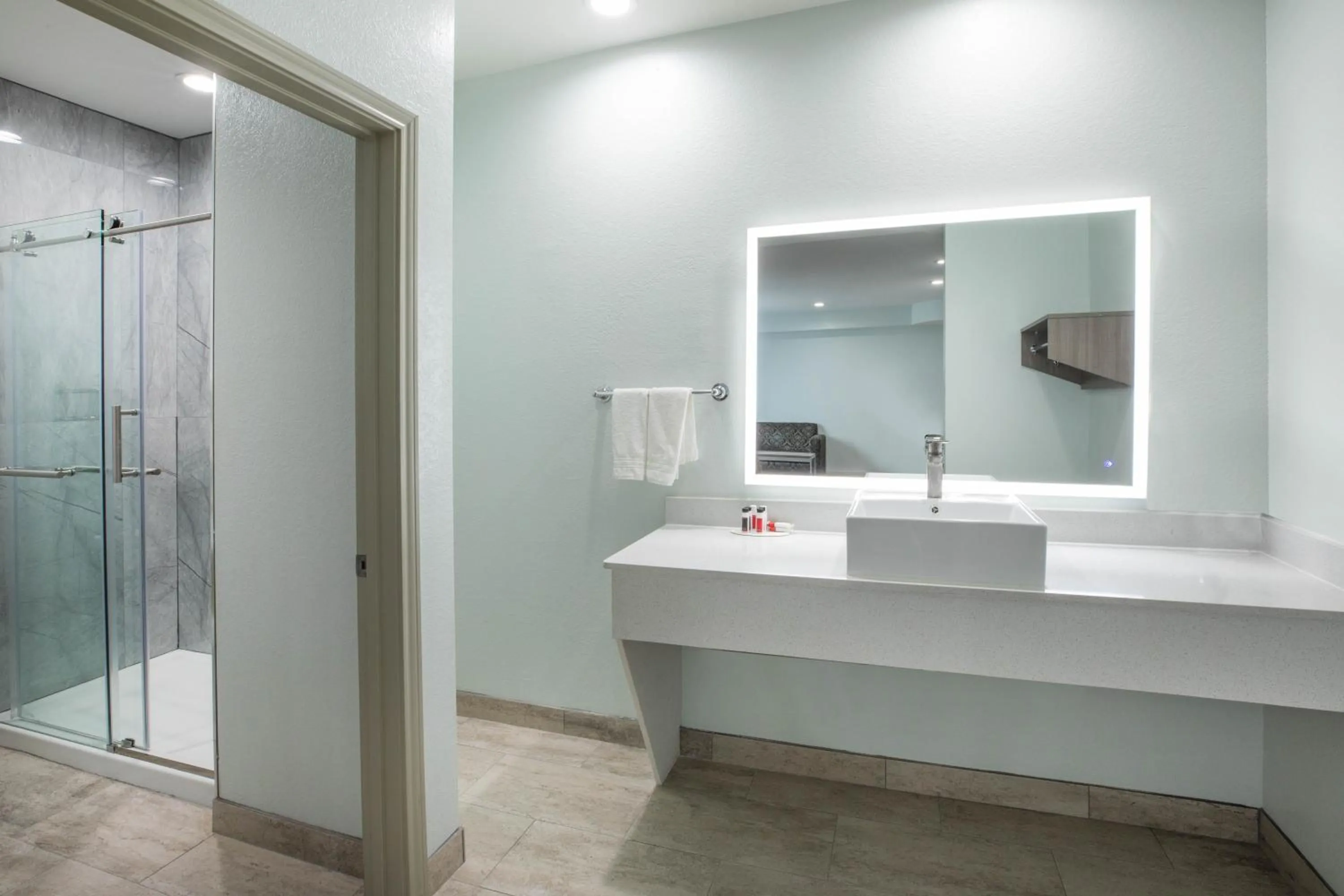 Bathroom in Super 8 by Wyndham Humble Houston Fallcreek