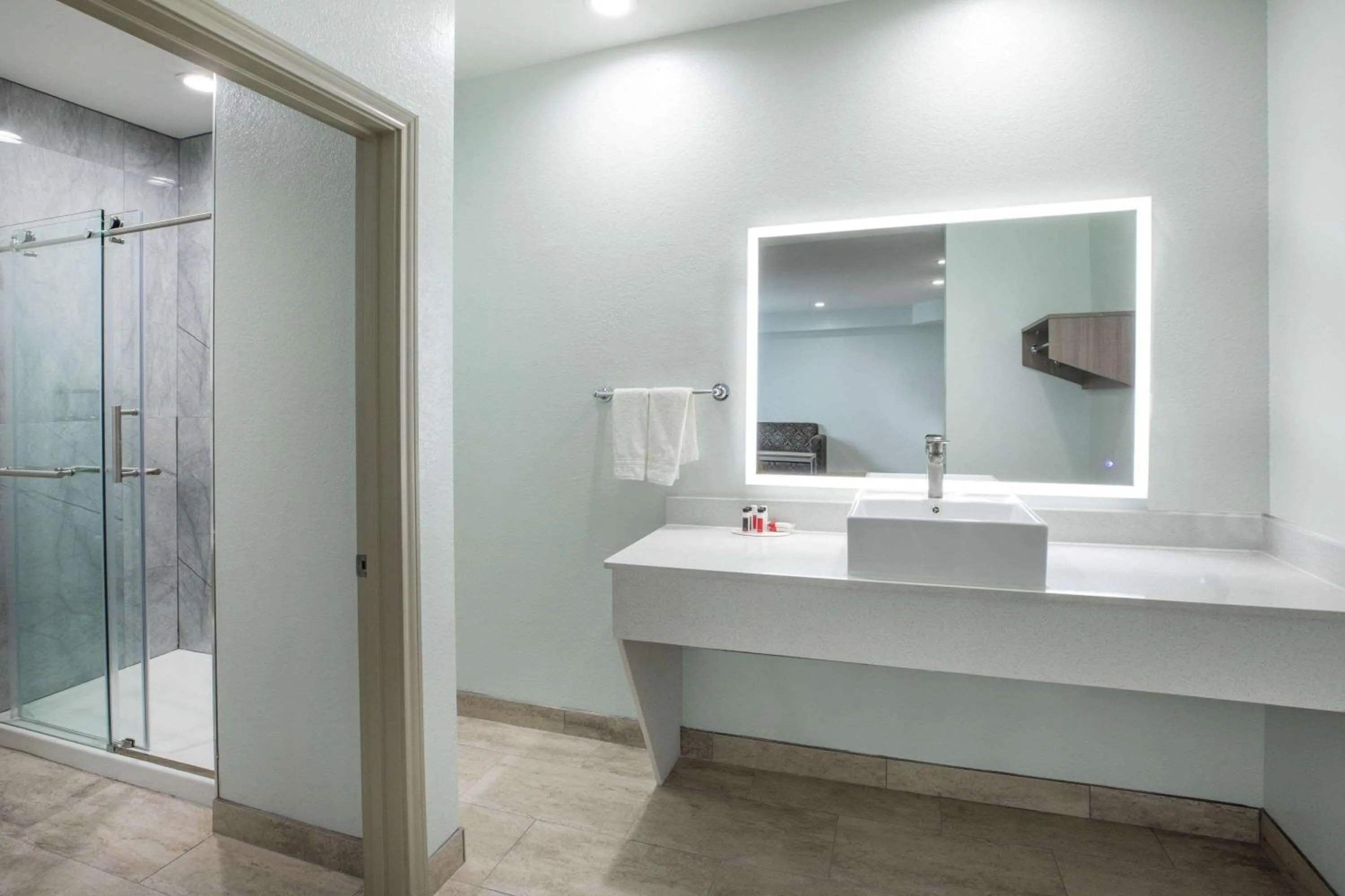 Bathroom in Super 8 by Wyndham Humble Houston Fallcreek