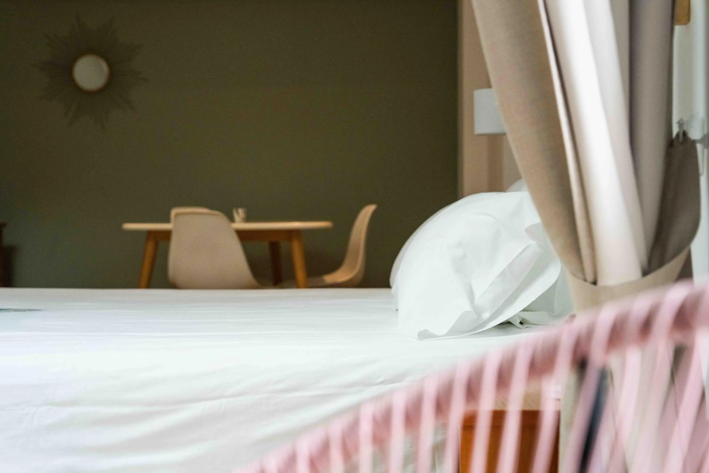 Bed in Hotel Logis Lacotel