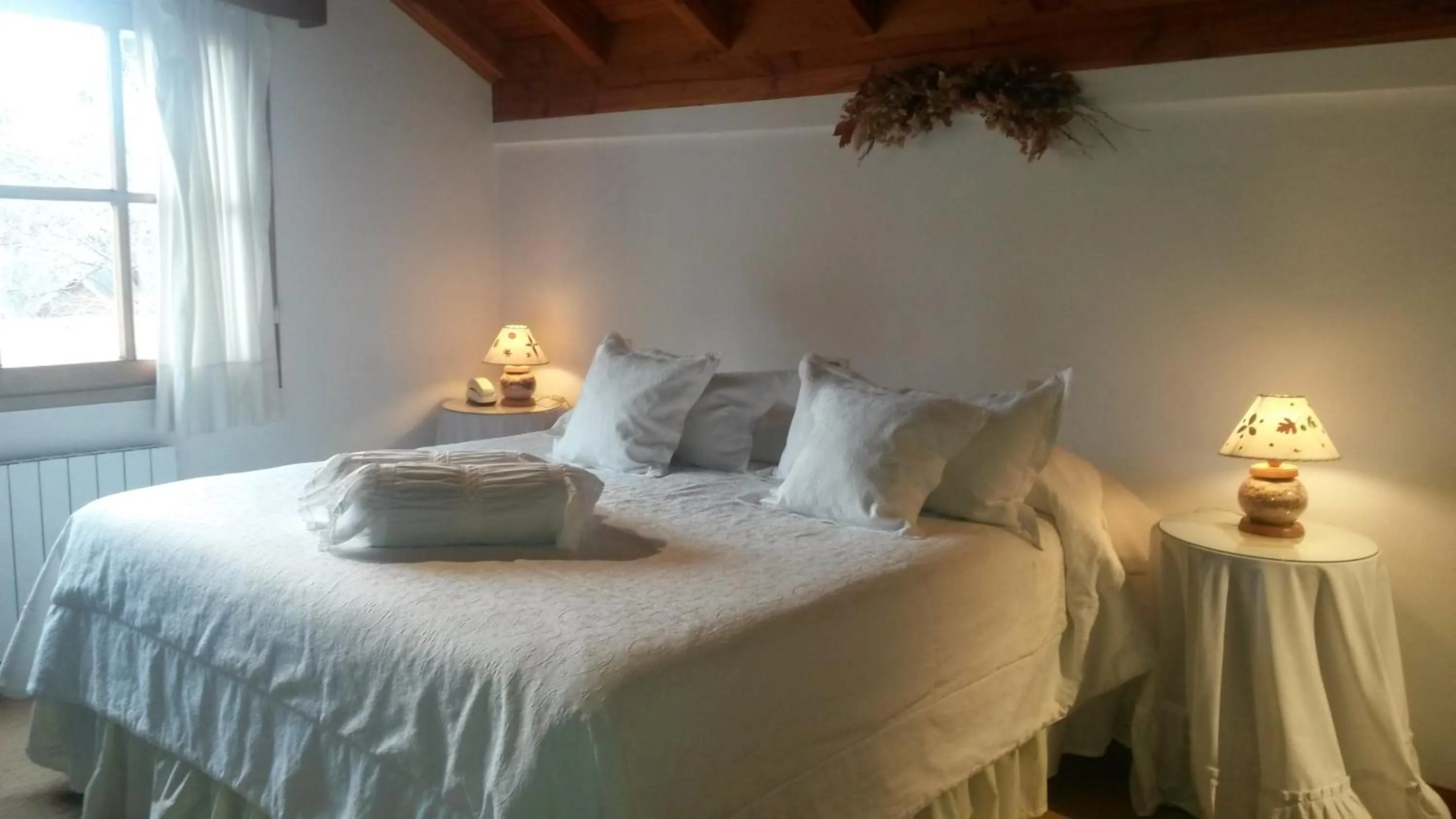 Bed in Hostería El Arbol Duende