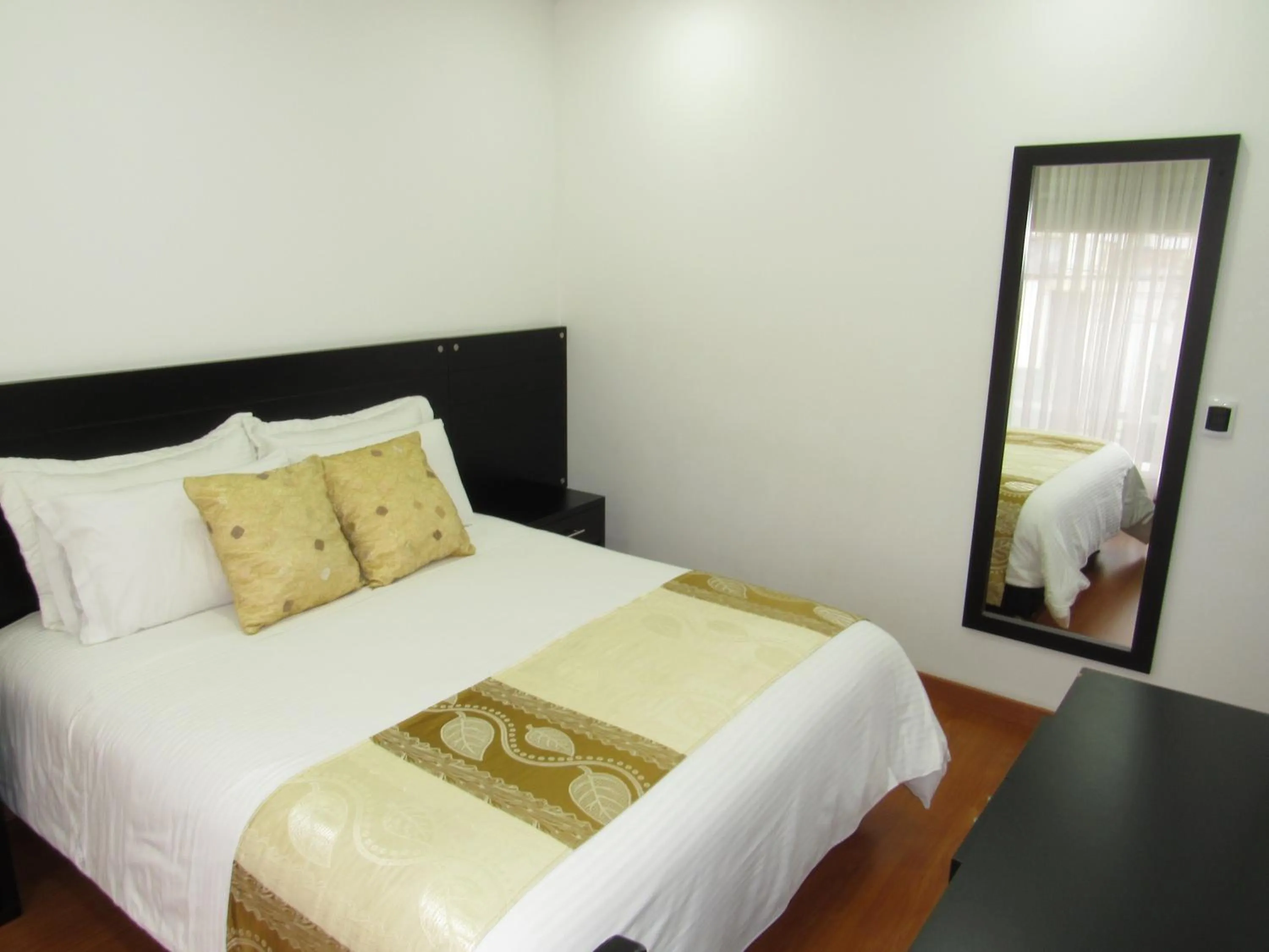 Bed in Hotel Palermo Suite