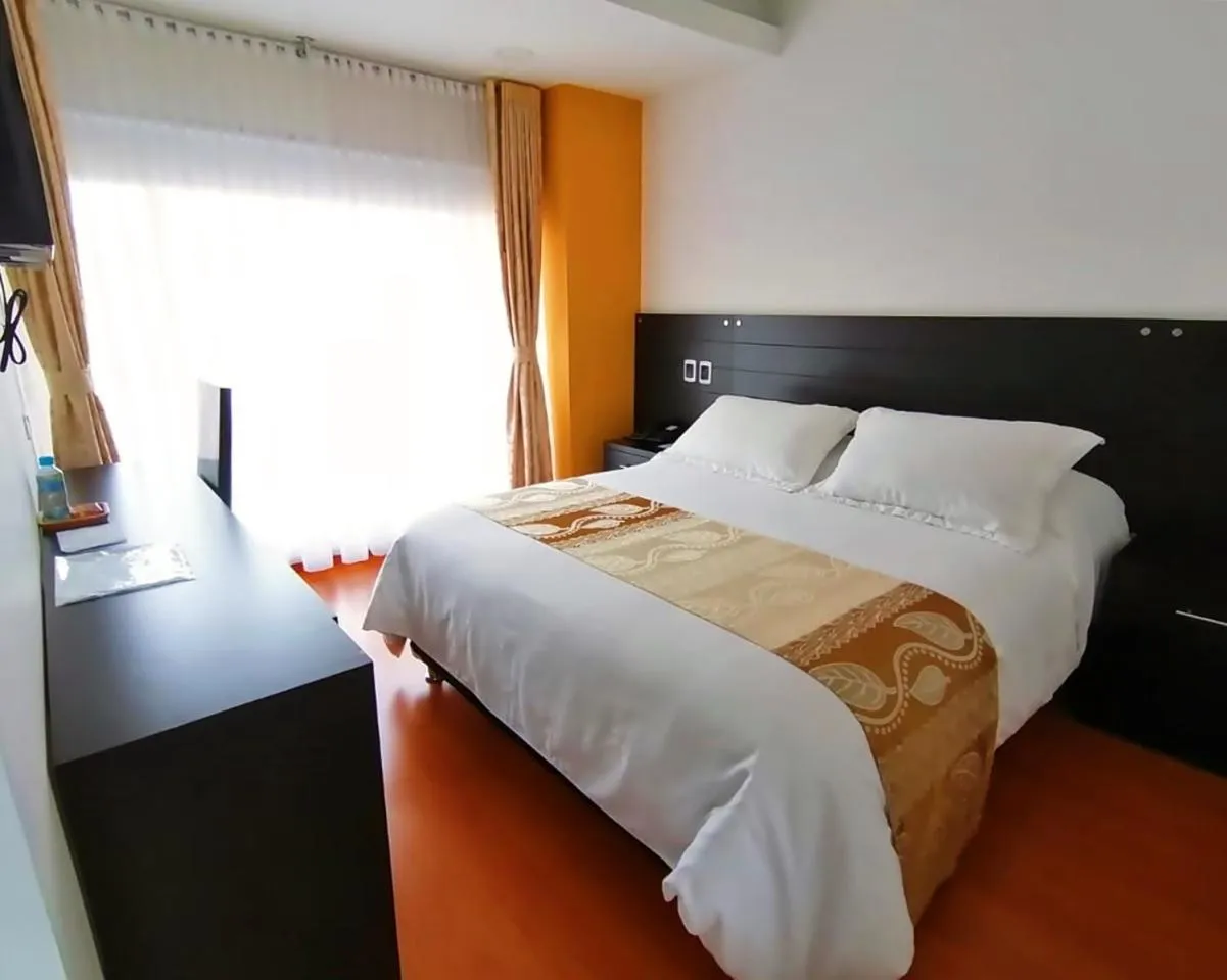 Bed in Hotel Palermo Suite