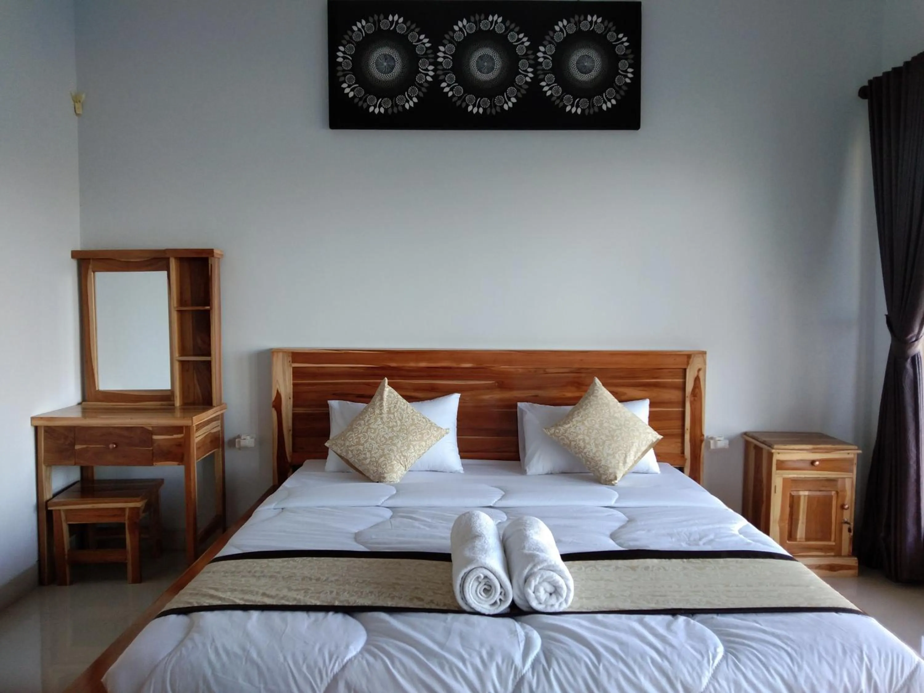 Bed in Batur Pyramid Guesthouse