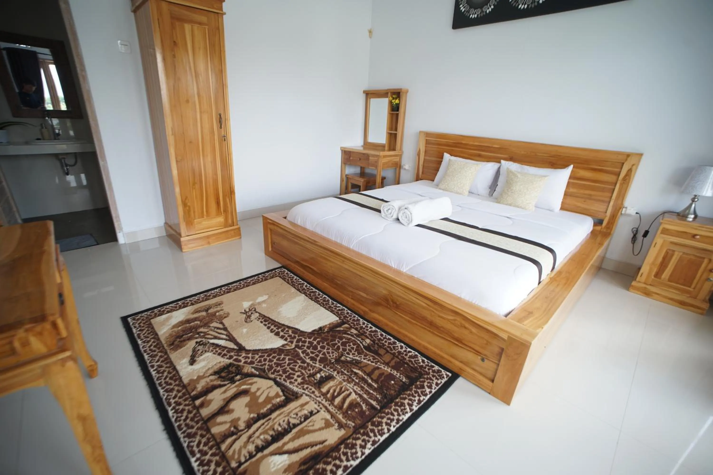 Bed in Batur Pyramid Guesthouse