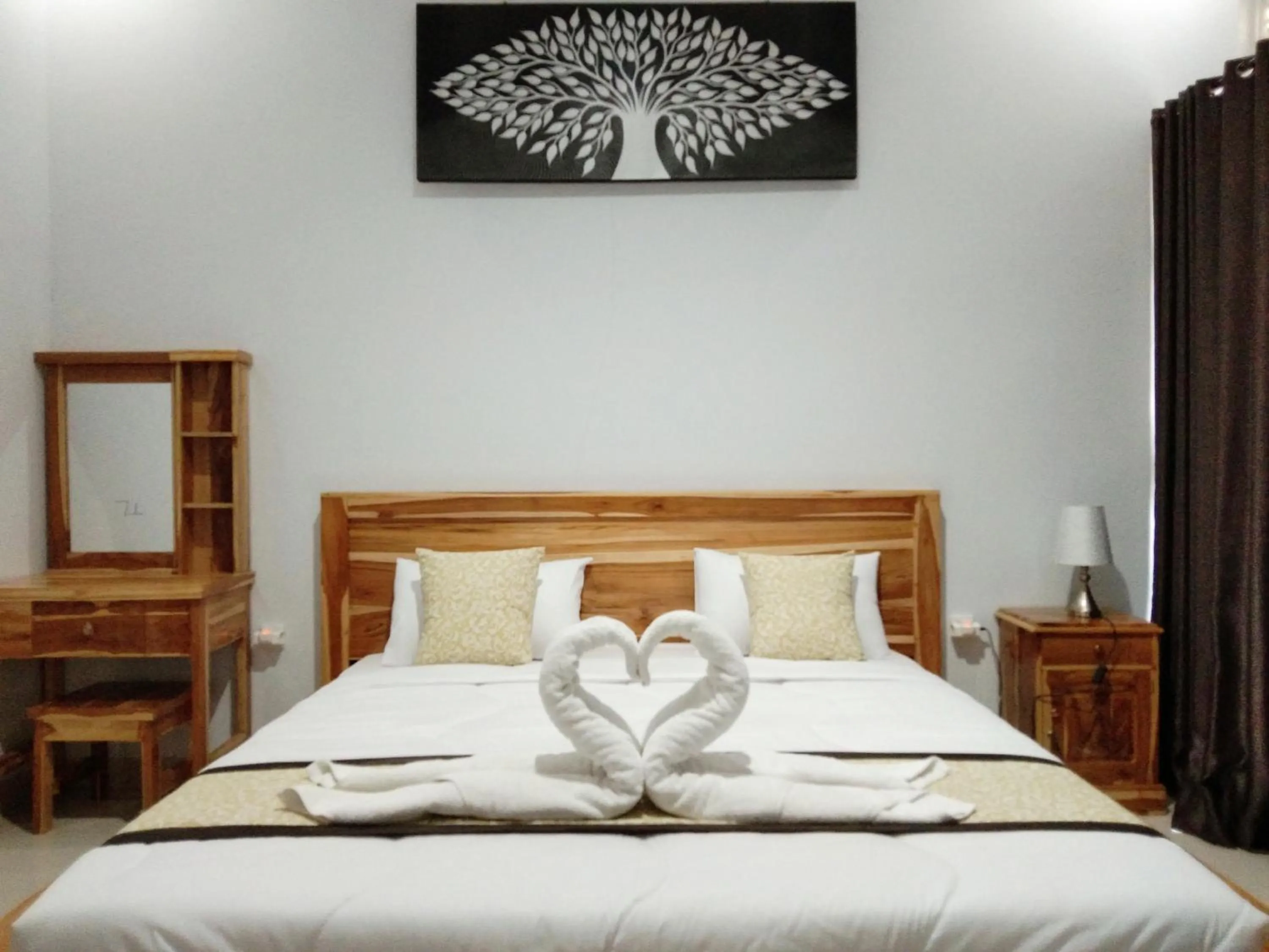 Bed in Batur Pyramid Guesthouse