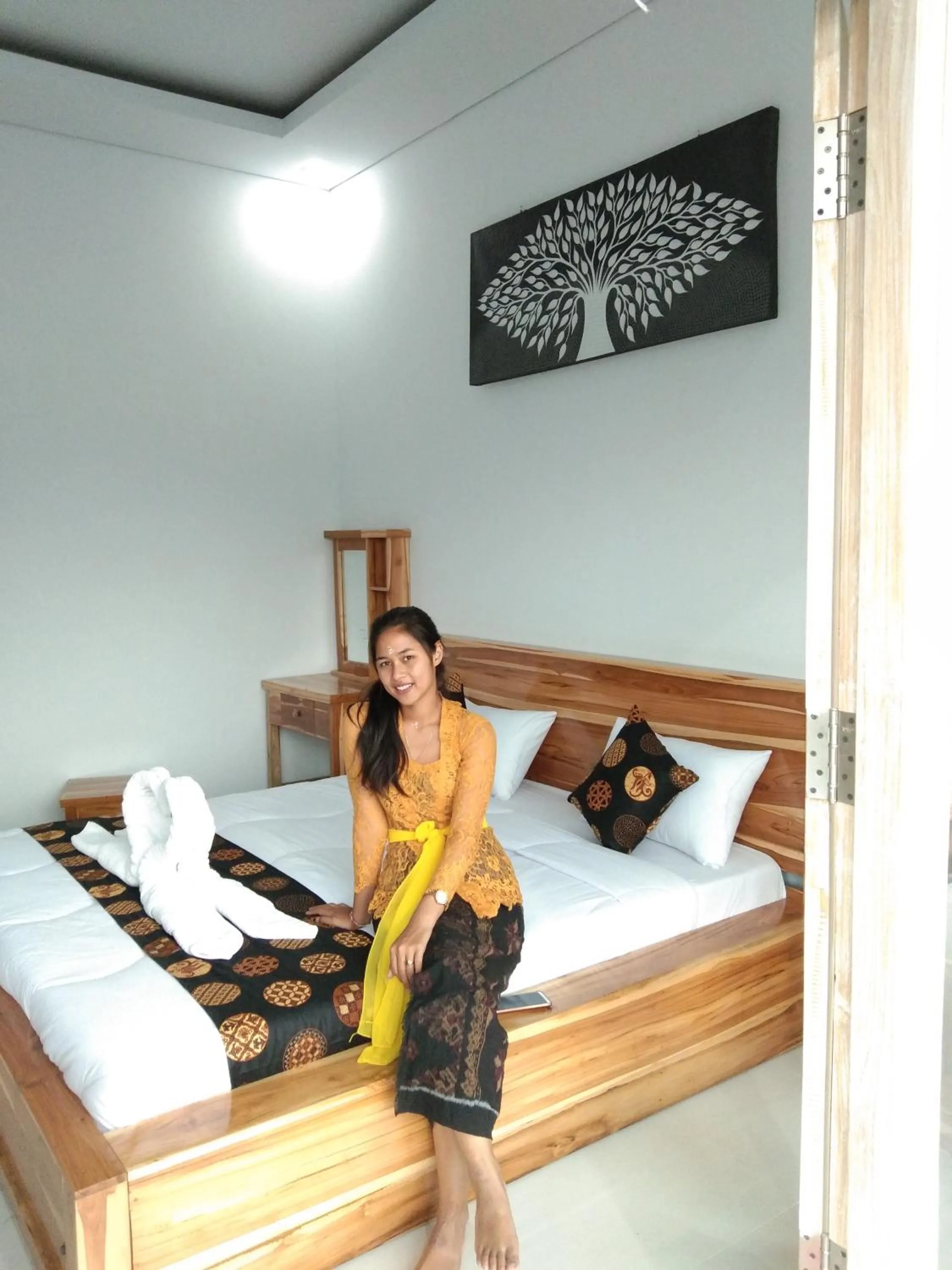 Bed in Batur Pyramid Guesthouse