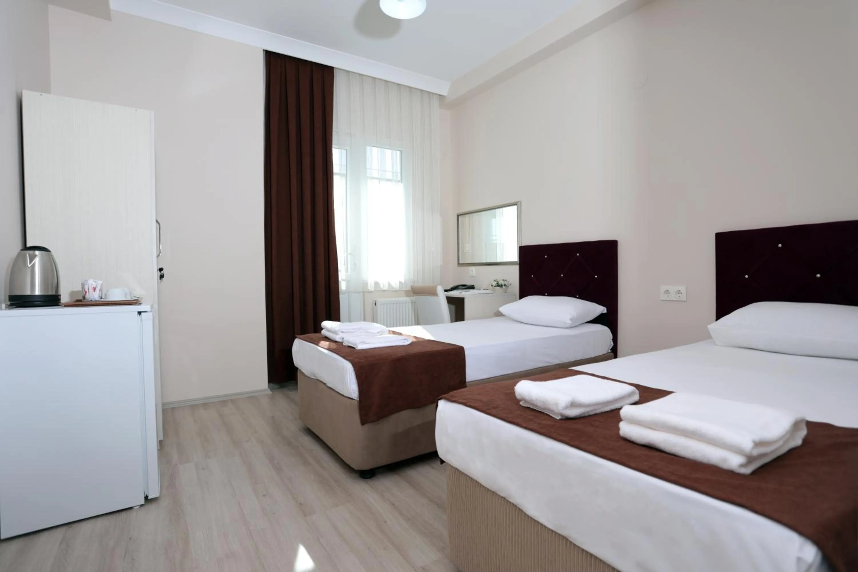 Bed in BEKSİTİ HOTEL