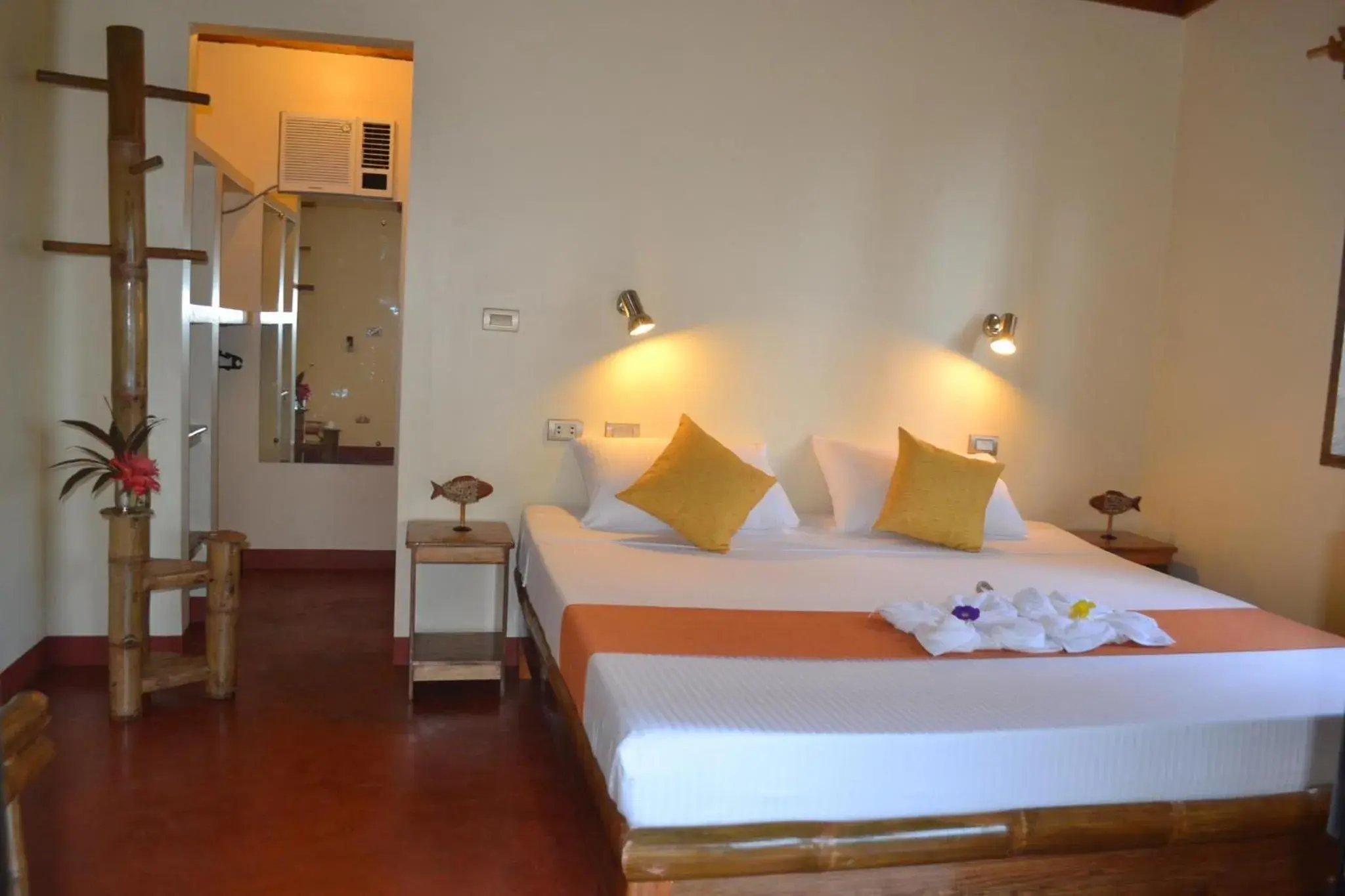 Photo of the whole room, Bed in Camiguin Volcan Beach Eco Retreat & Dive Resort Photo of the whole room, Bed in Camiguin Volcan Beach Eco Retreat & Dive Resort