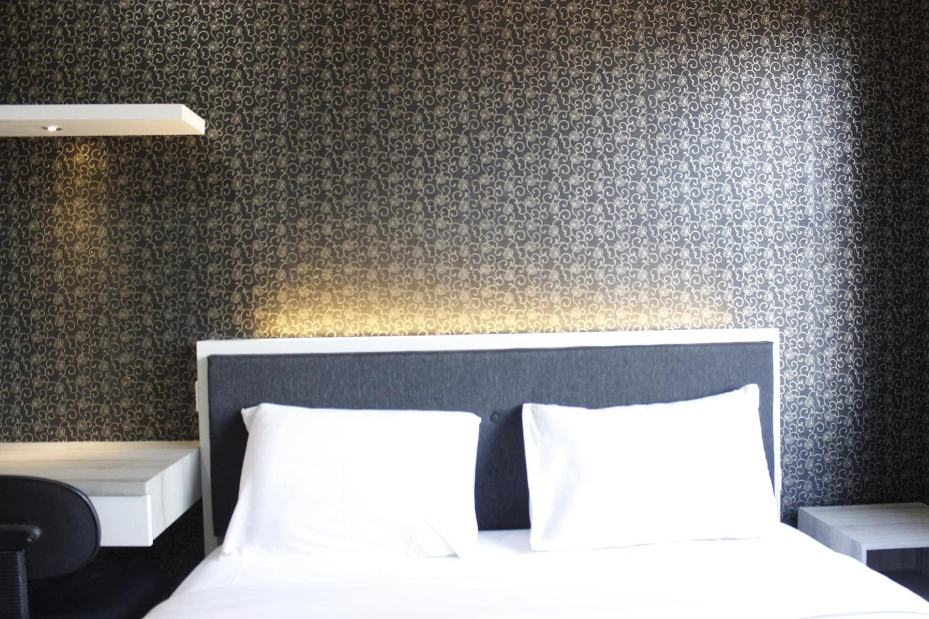 Bed in Quiet 2BR Apartment @ Parahyangan Residence Apartement with Mountain View By Travelio