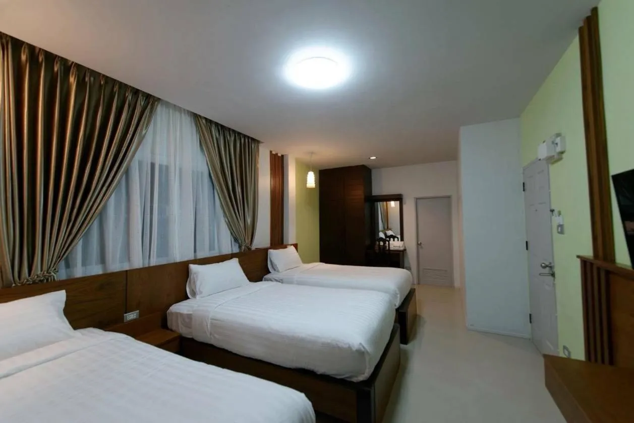 Bed in Chedi Chiangrai Boutique Hotel