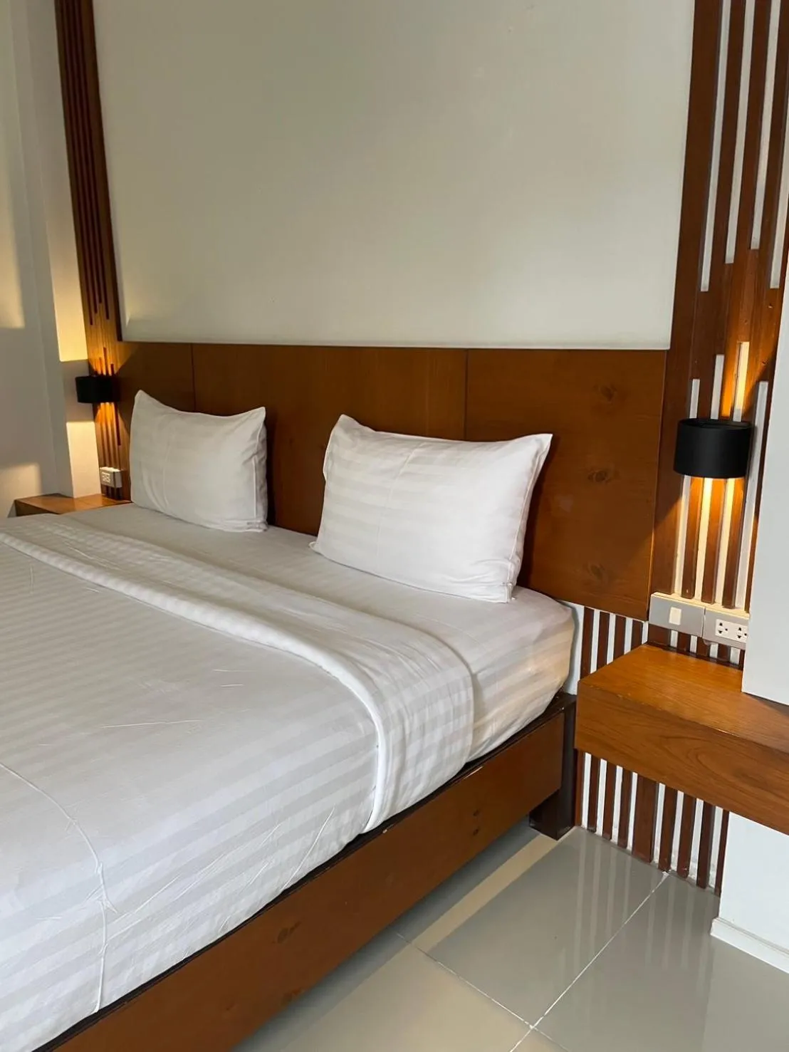 Bed in Chedi Chiangrai Boutique Hotel