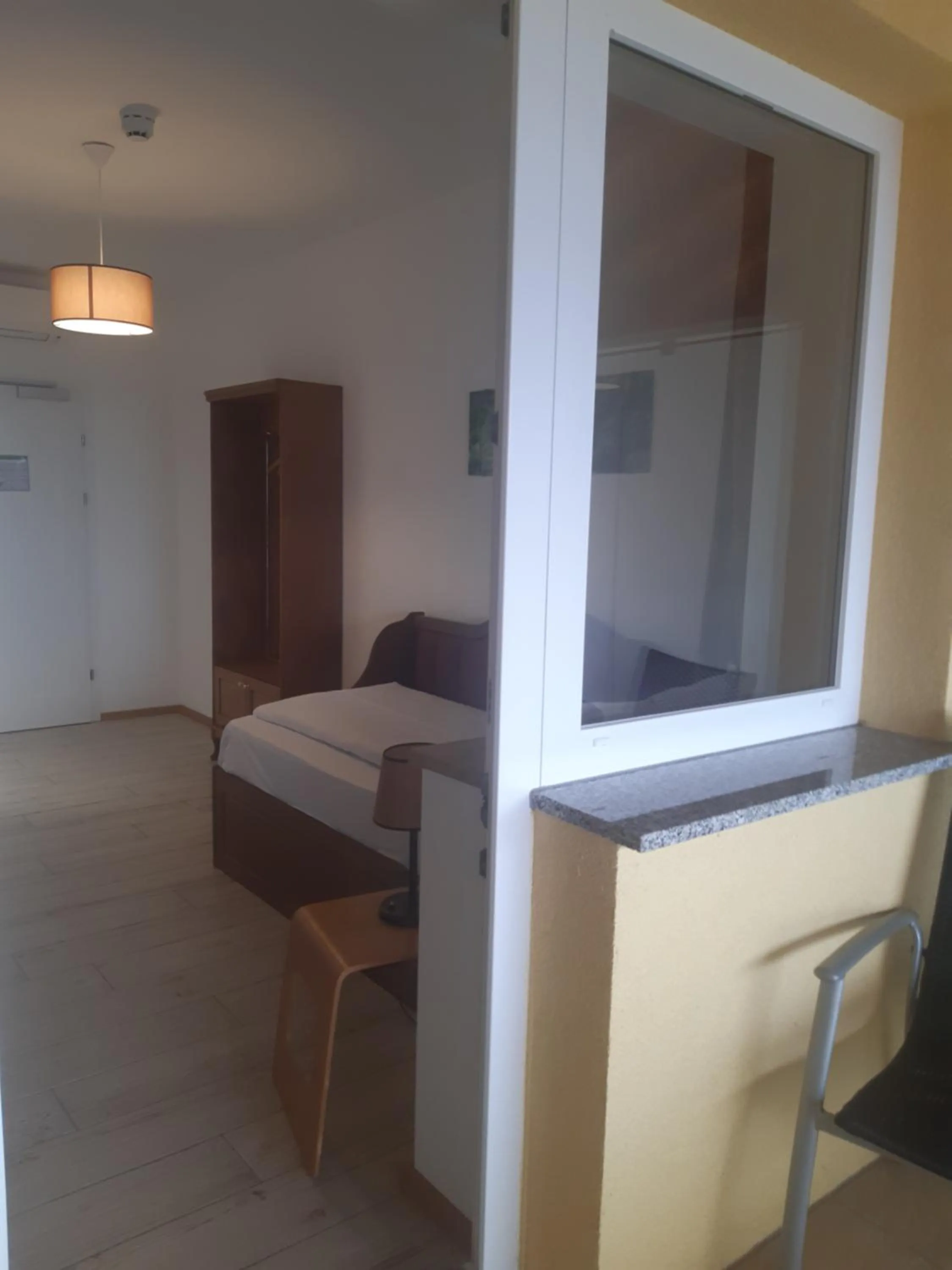 Bed in VULKAN Residenz Hotel I Self Check-in