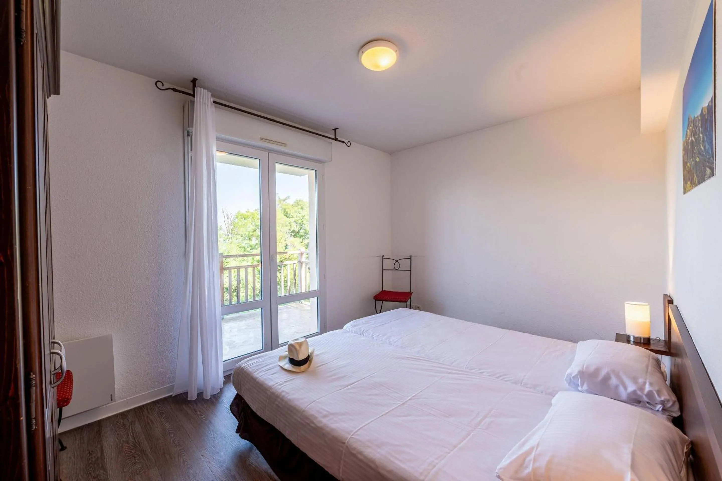 Bedroom, Bed in Zenitude Evian Les Terrasses du Lac, an Ascend Collection Hotel