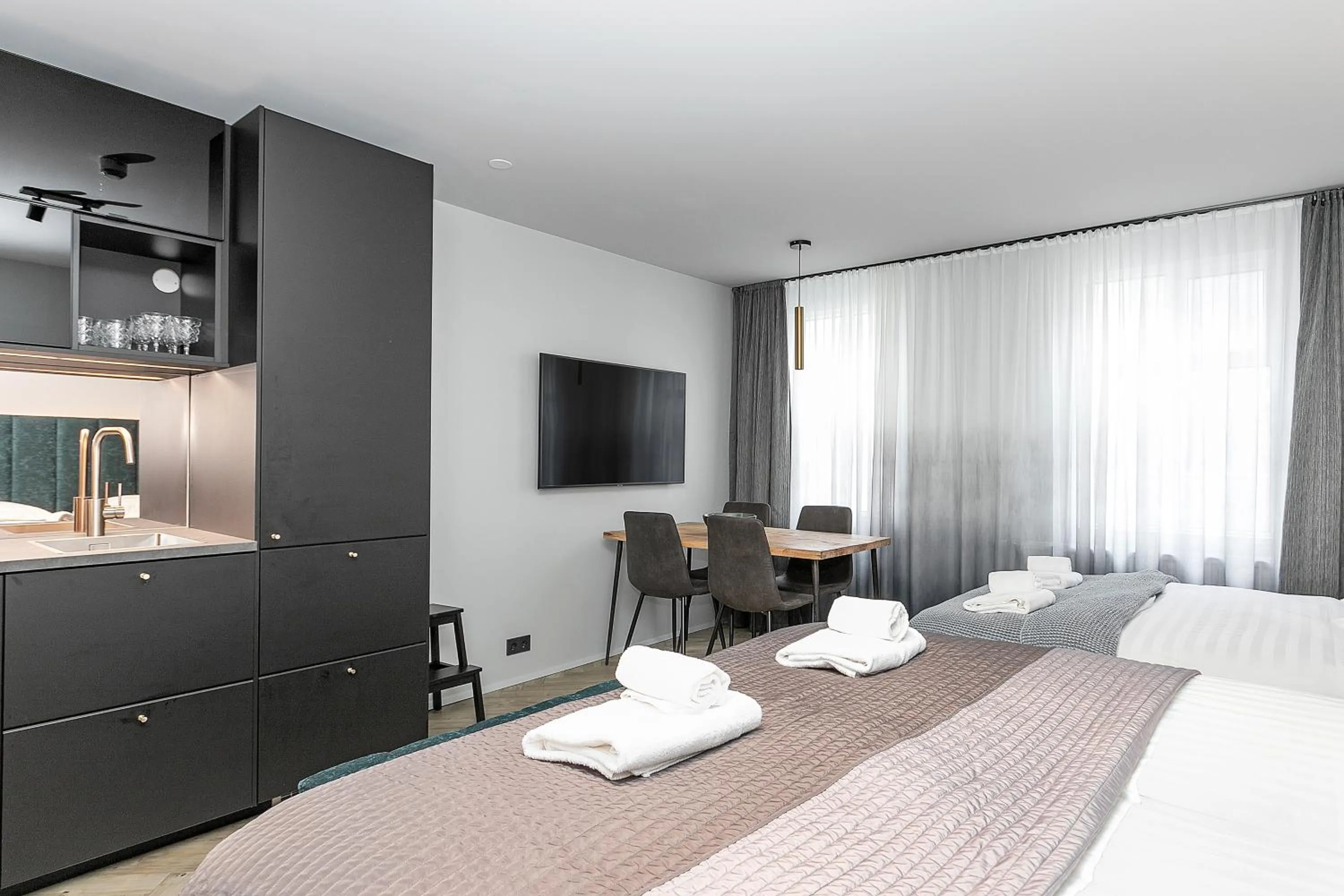 Bed in Backyard Apartments by Heimaleiga