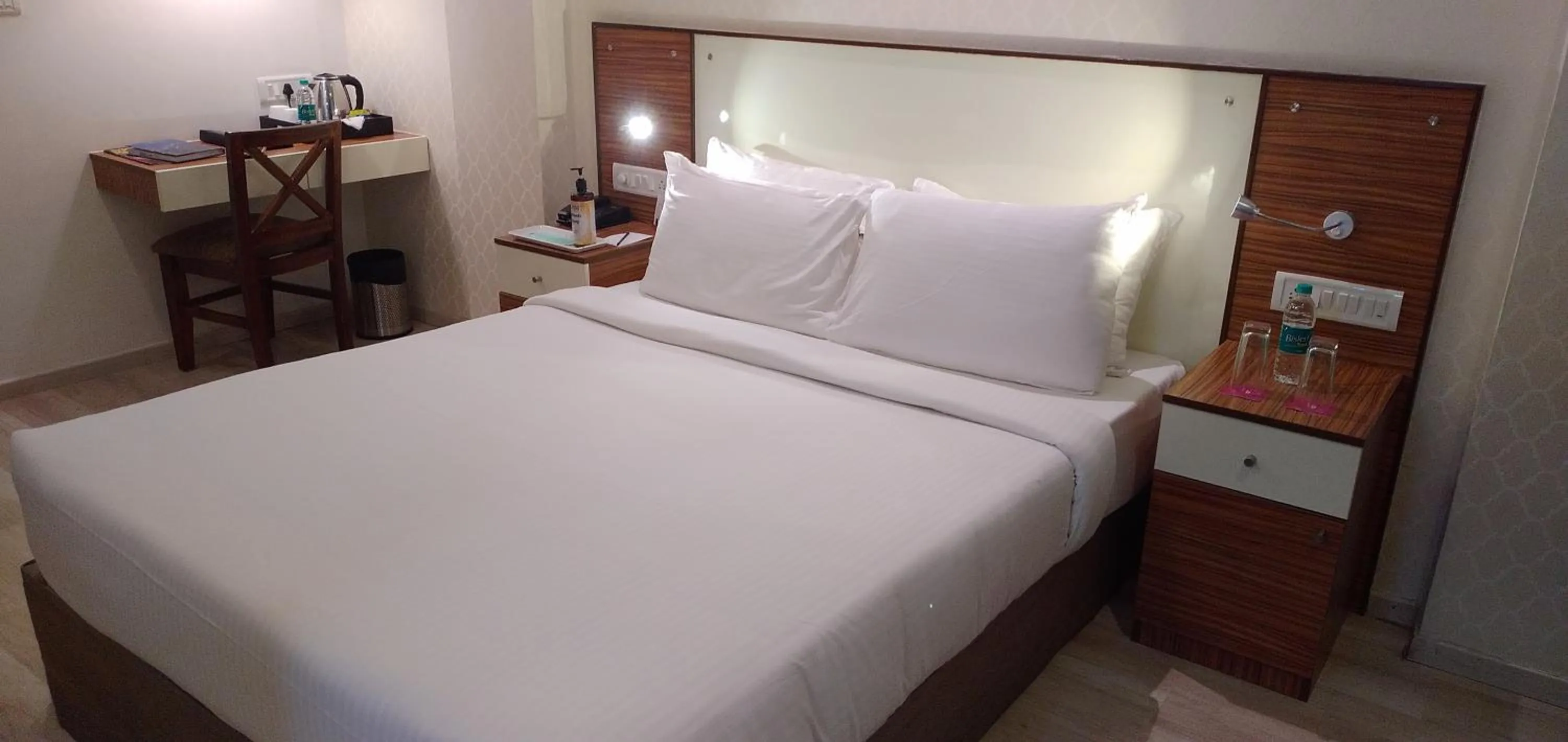 Bed in Regenta Inn Indiranagar by Royal Orchid Hotels